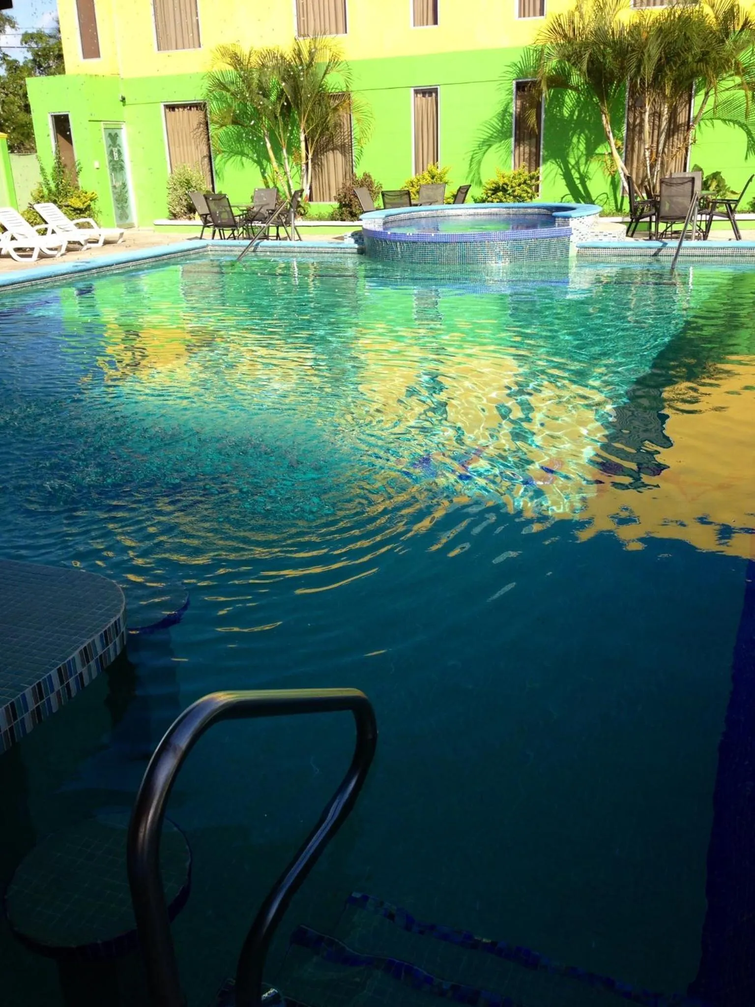 Swimming pool in Airport Suites Hotel