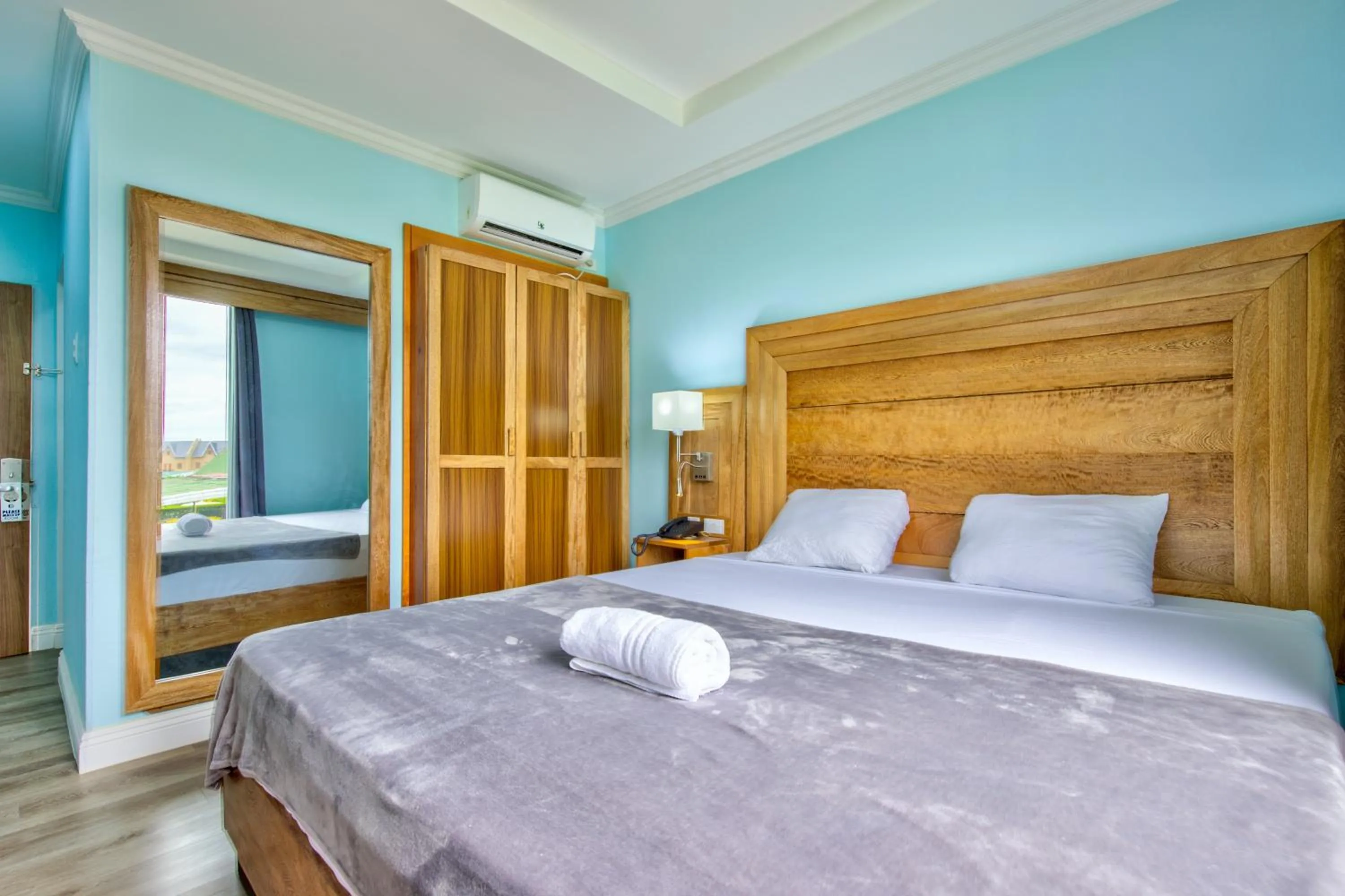 Bed in Airport Suites Hotel