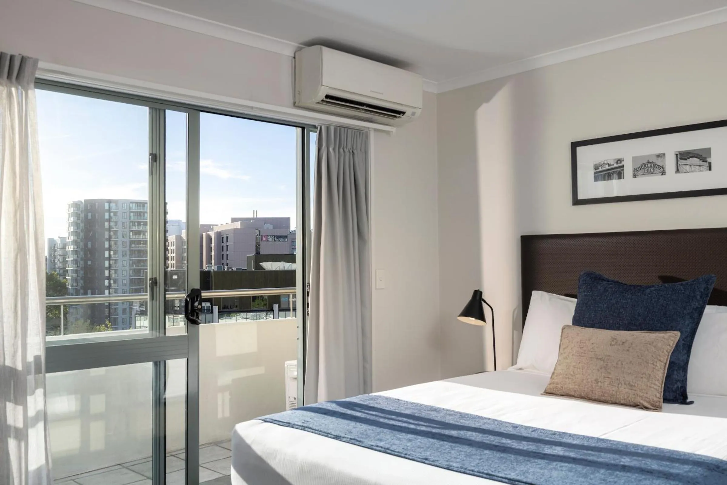 Bed in Quest Auckland Serviced Apartments