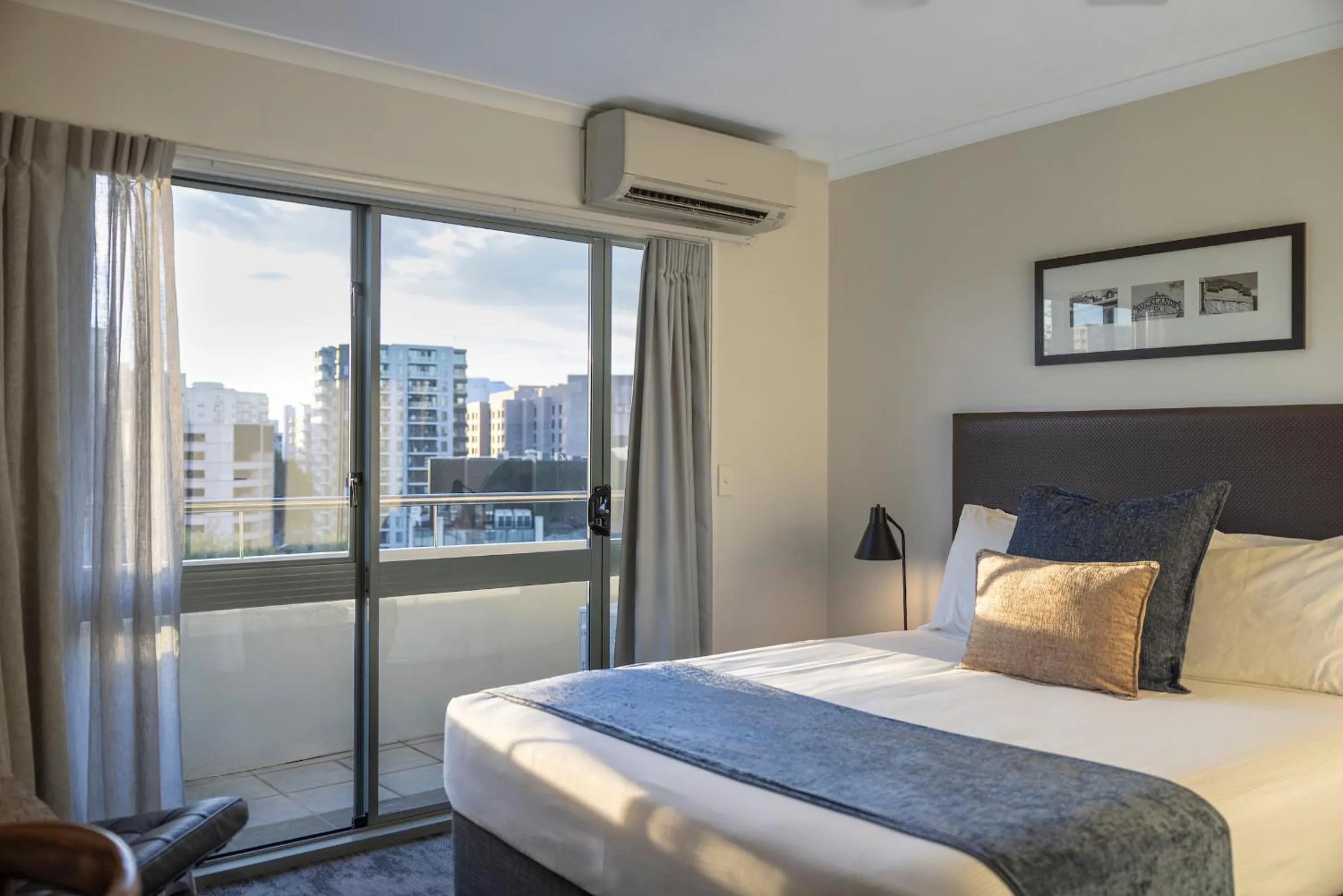 Bed in Quest Auckland Serviced Apartments