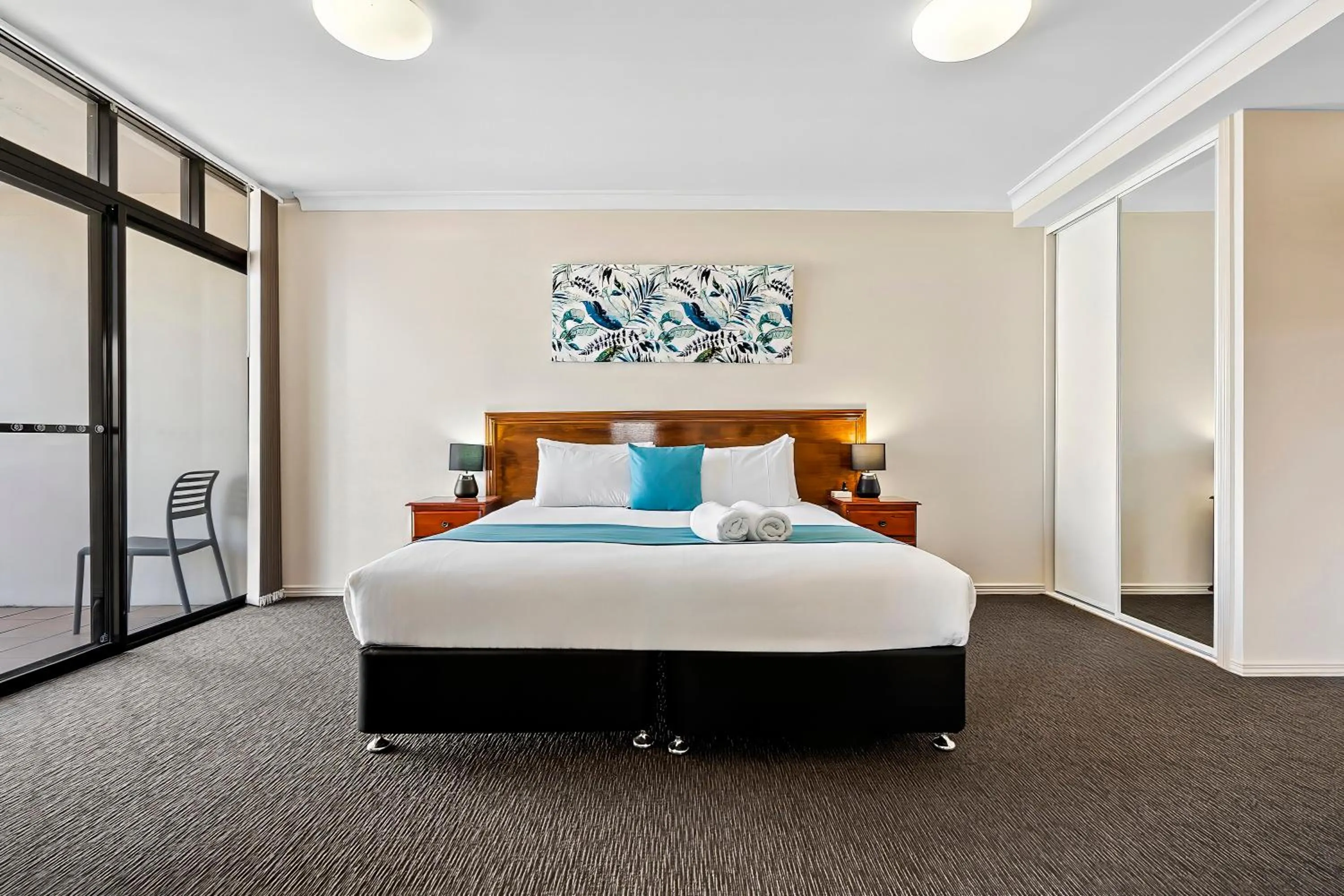 Bedroom, Bed in Cityville Apartments & Motel