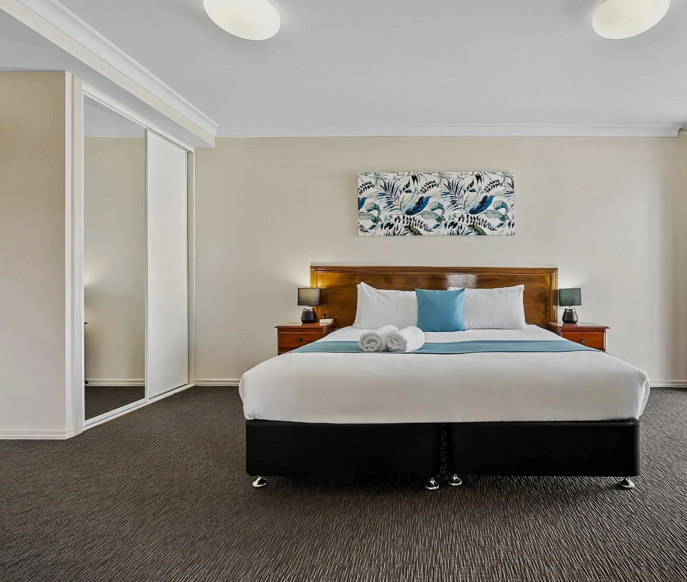 Bedroom, Bed in Cityville Apartments & Motel