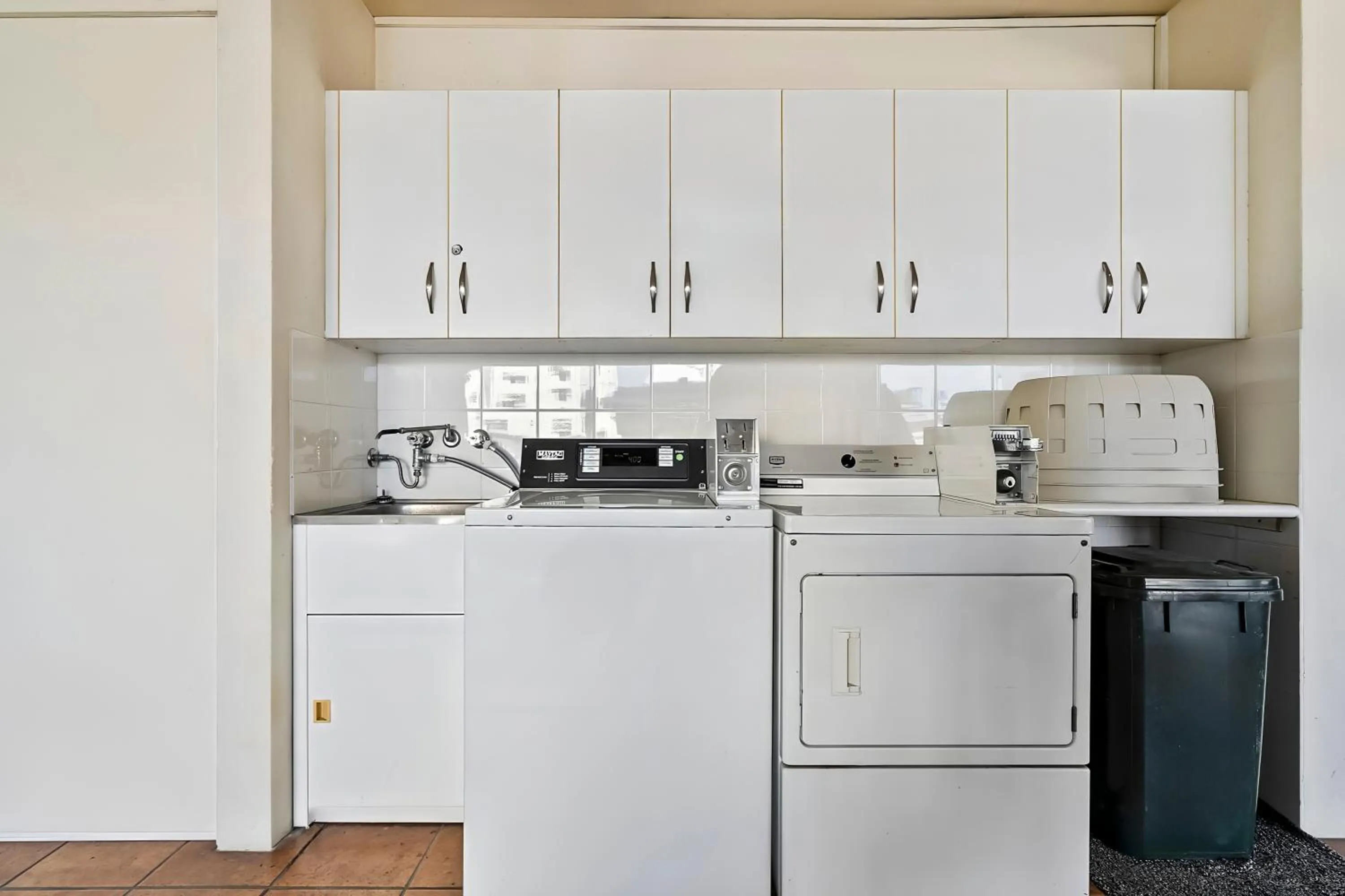 laundry in Cityville Apartments & Motel