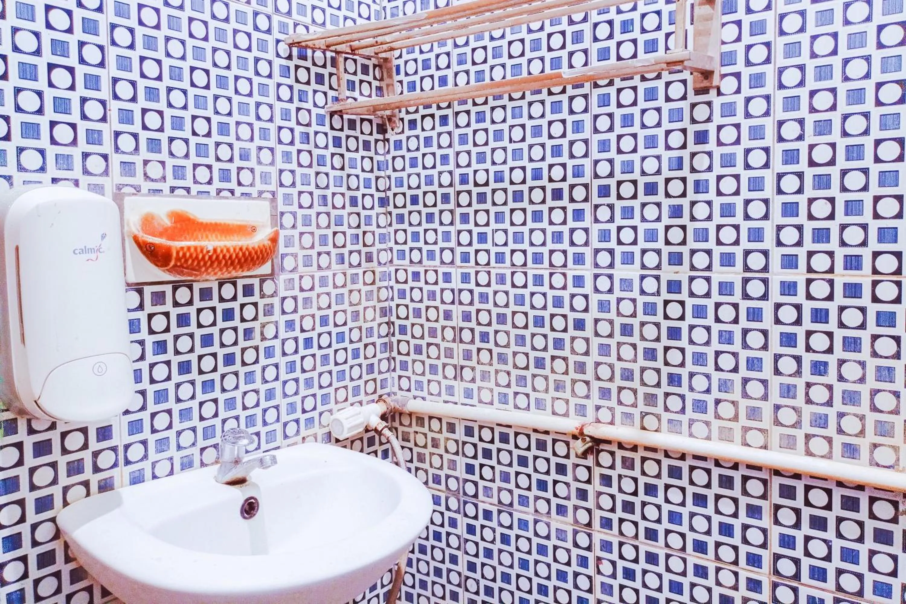 Bathroom in Urbanview at Wedika Hotel Bengkulu