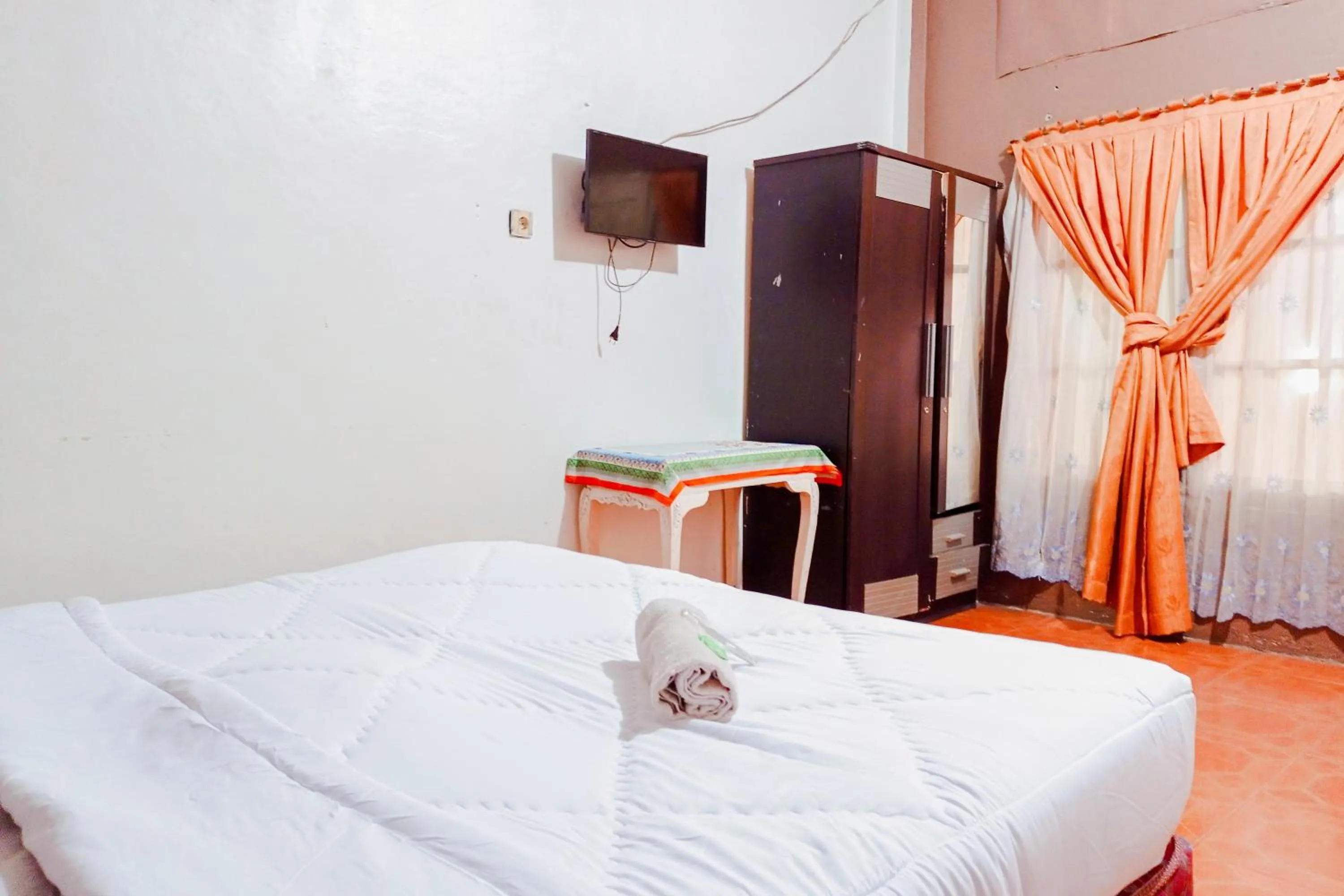 Bedroom, Bed in Urbanview at Wedika Hotel Bengkulu