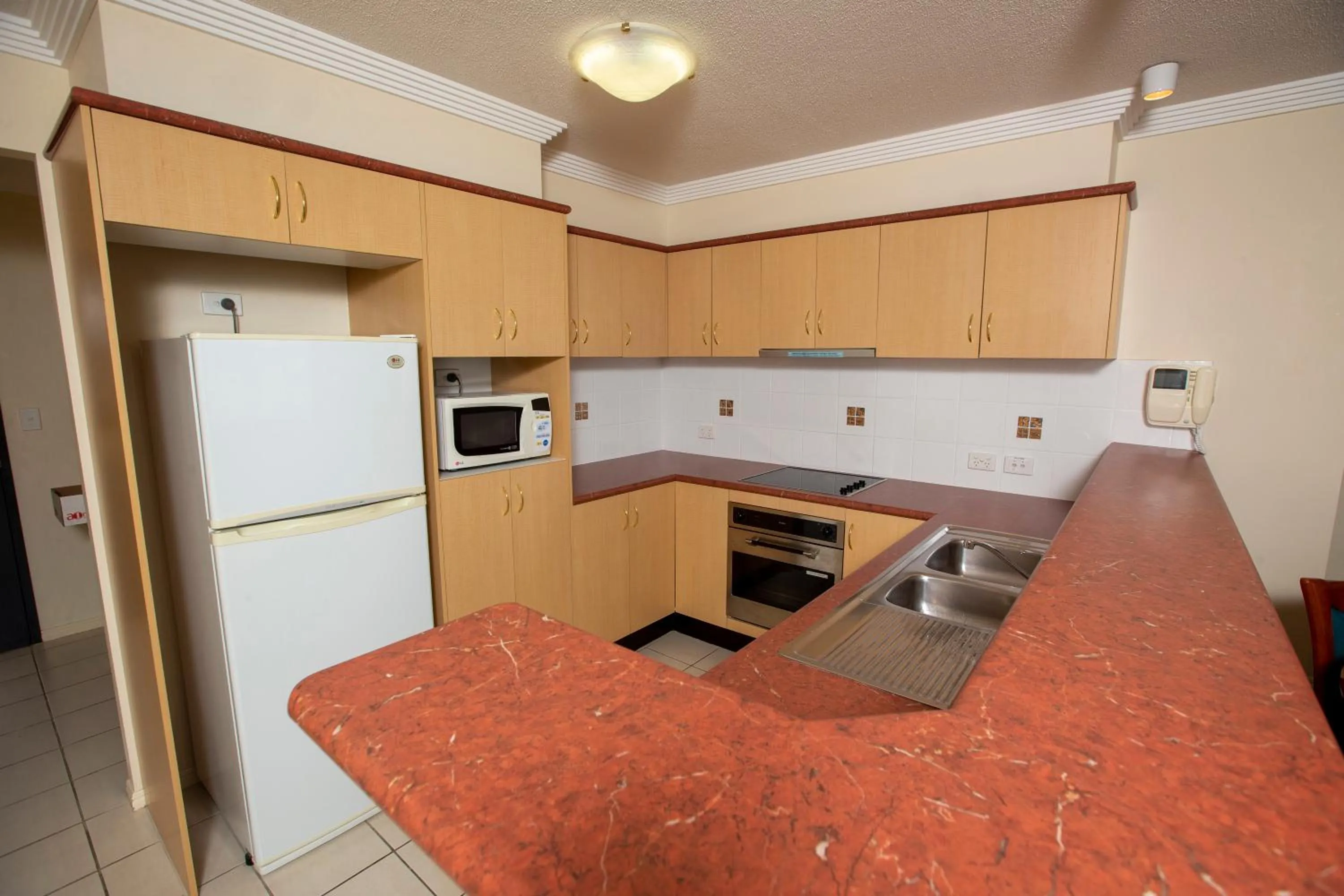 kitchen in Springwood Tower Apartment Hotel