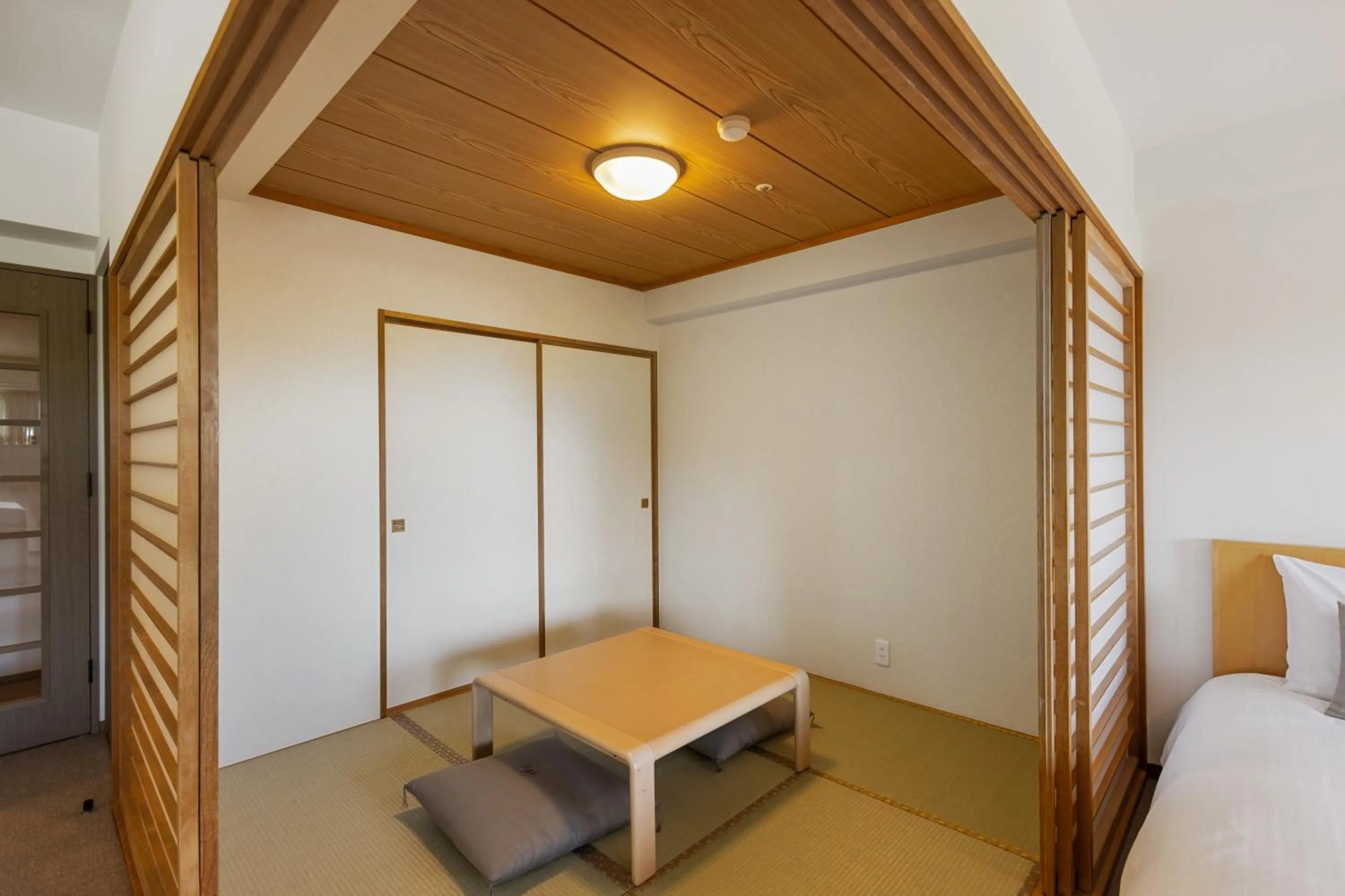 Living room, Bed in One Niseko Resort Towers