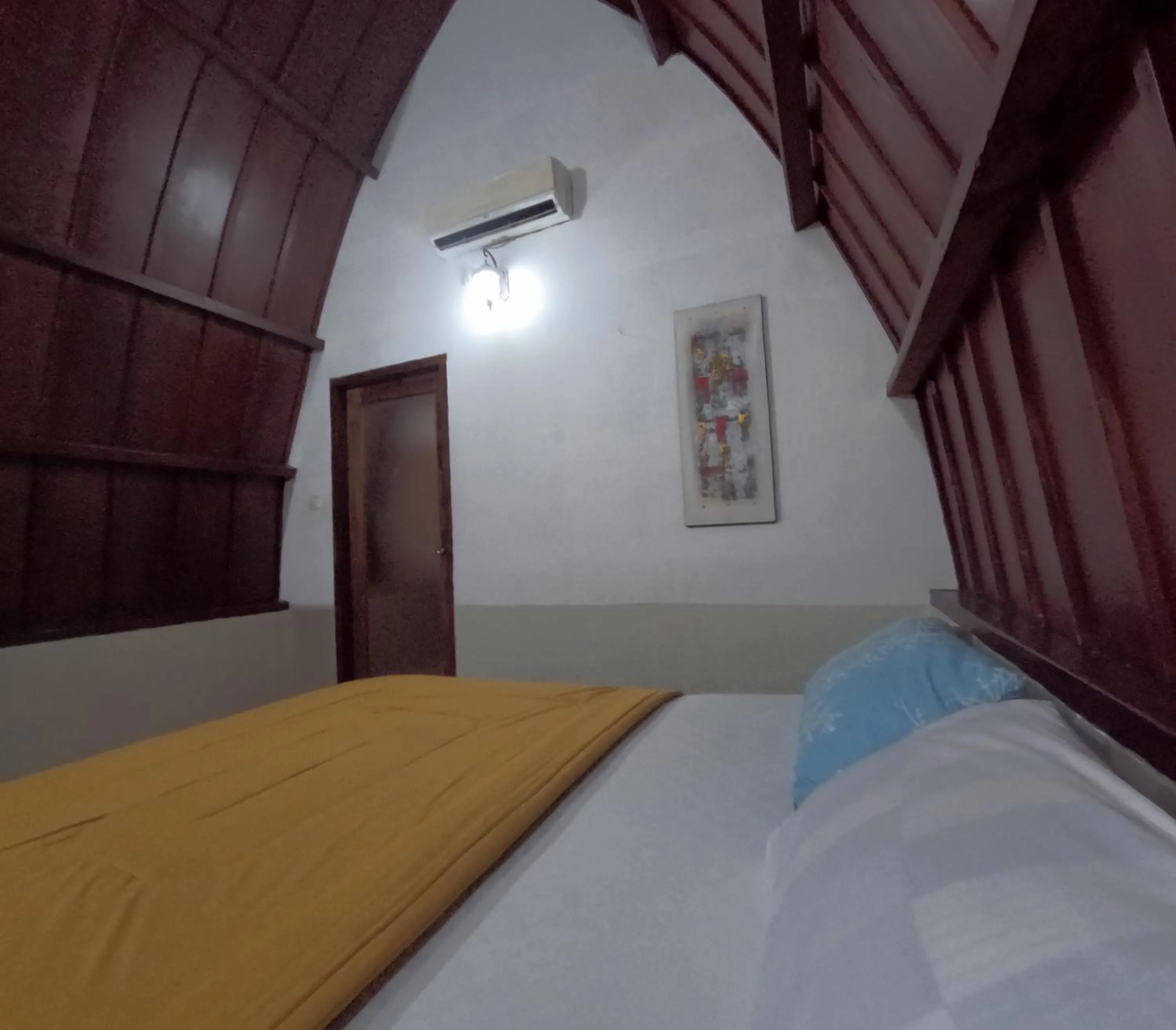 Bed in Banana Leaf Bungalow