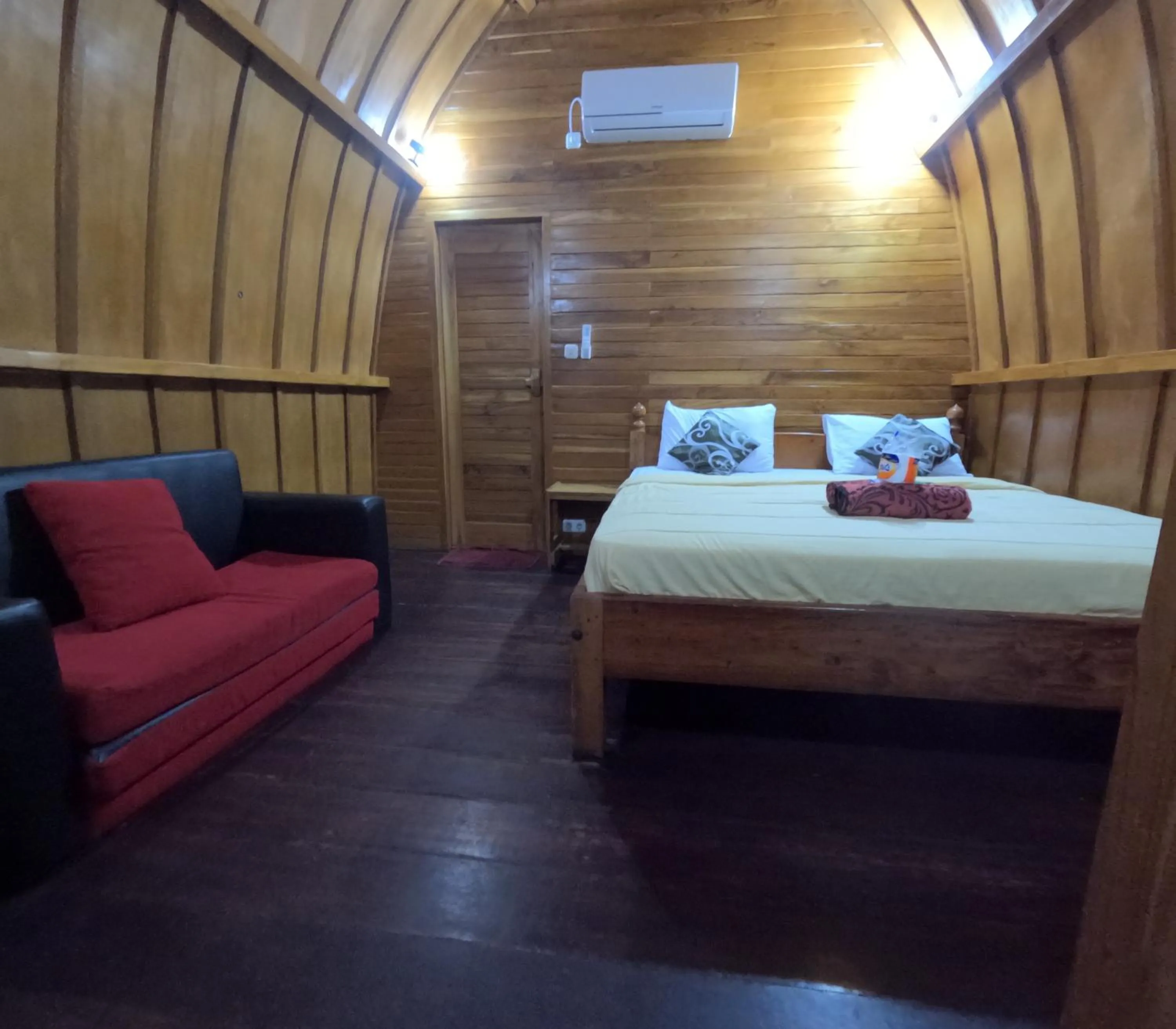 Bed in Banana Leaf Bungalow