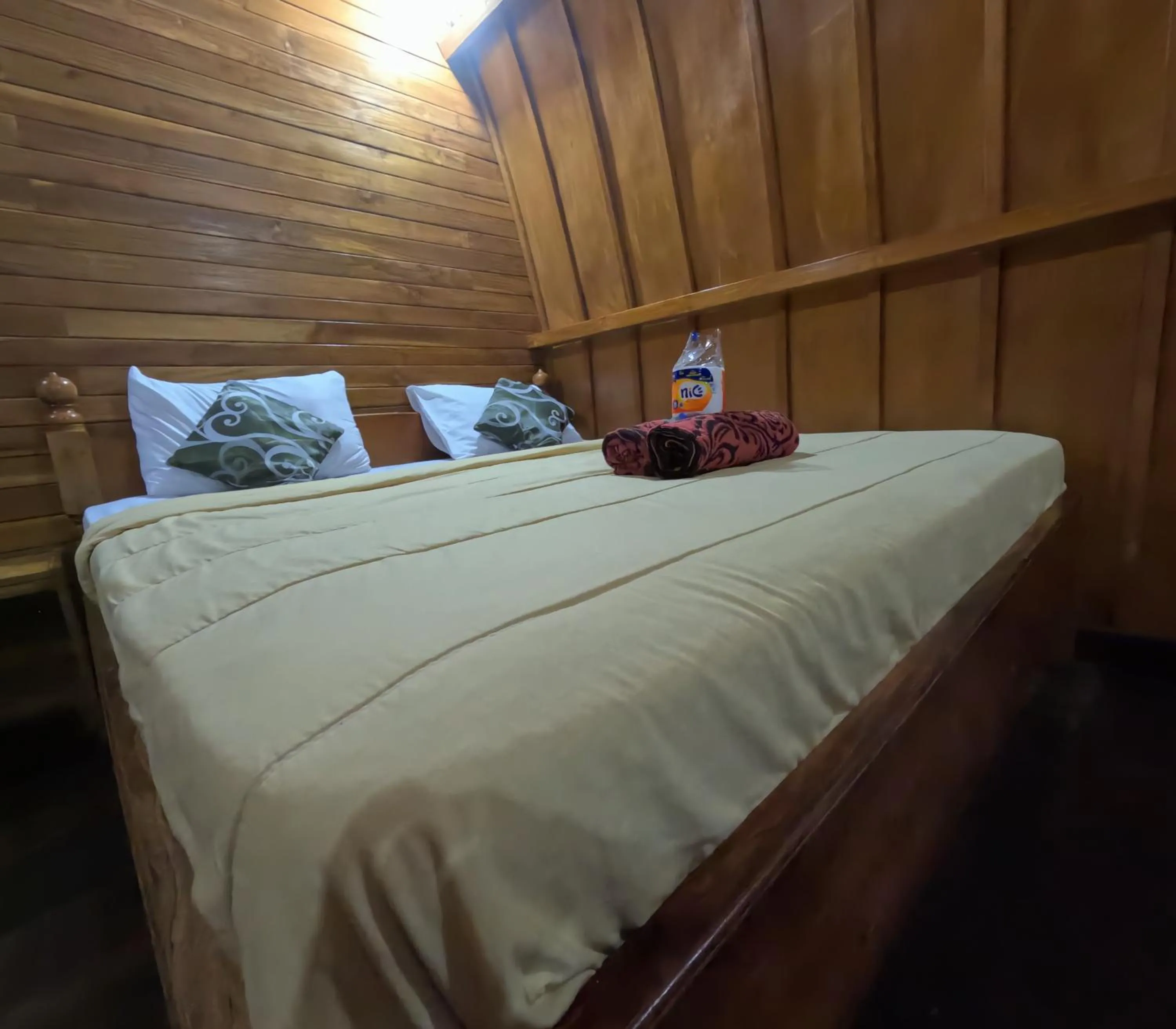 Bed in Banana Leaf Bungalow