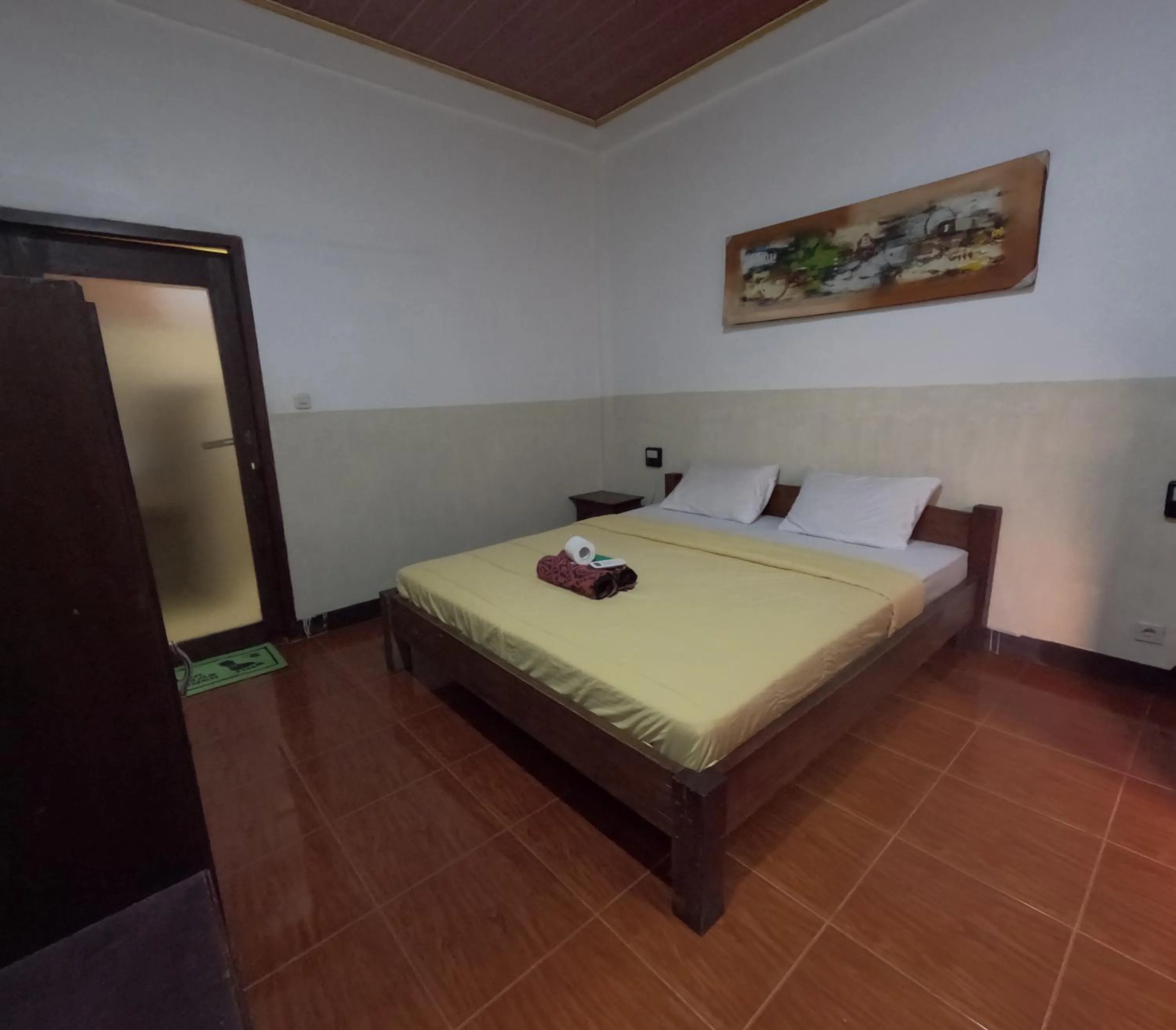 Bed in Banana Leaf Bungalow