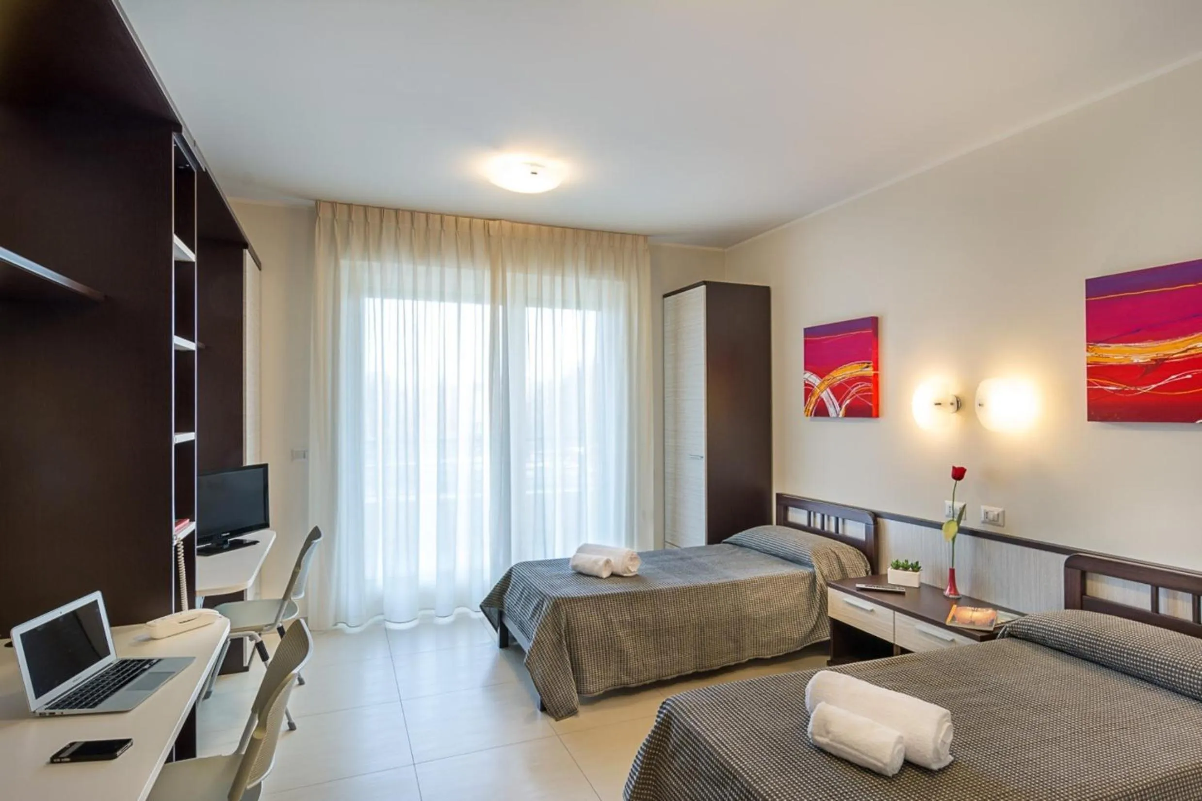 Bed, TV/Entertainment Center in Hotel Spazio Residenza