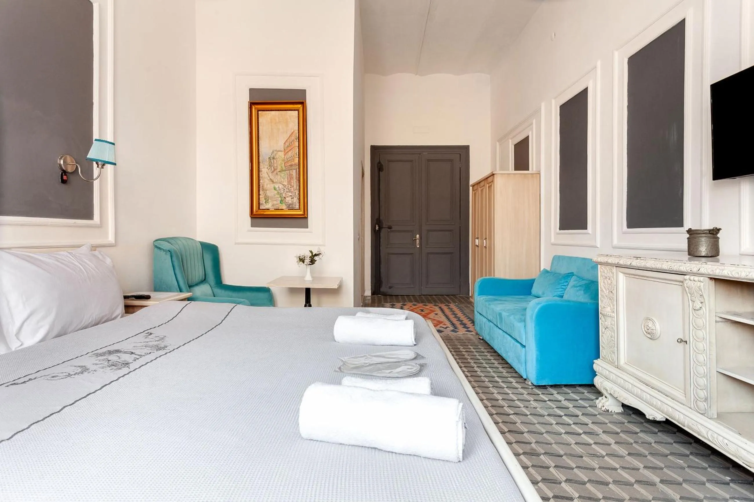 Bed in Cezayir Rooms