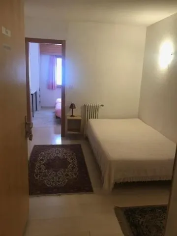 Bed in Hotel Mirabeau