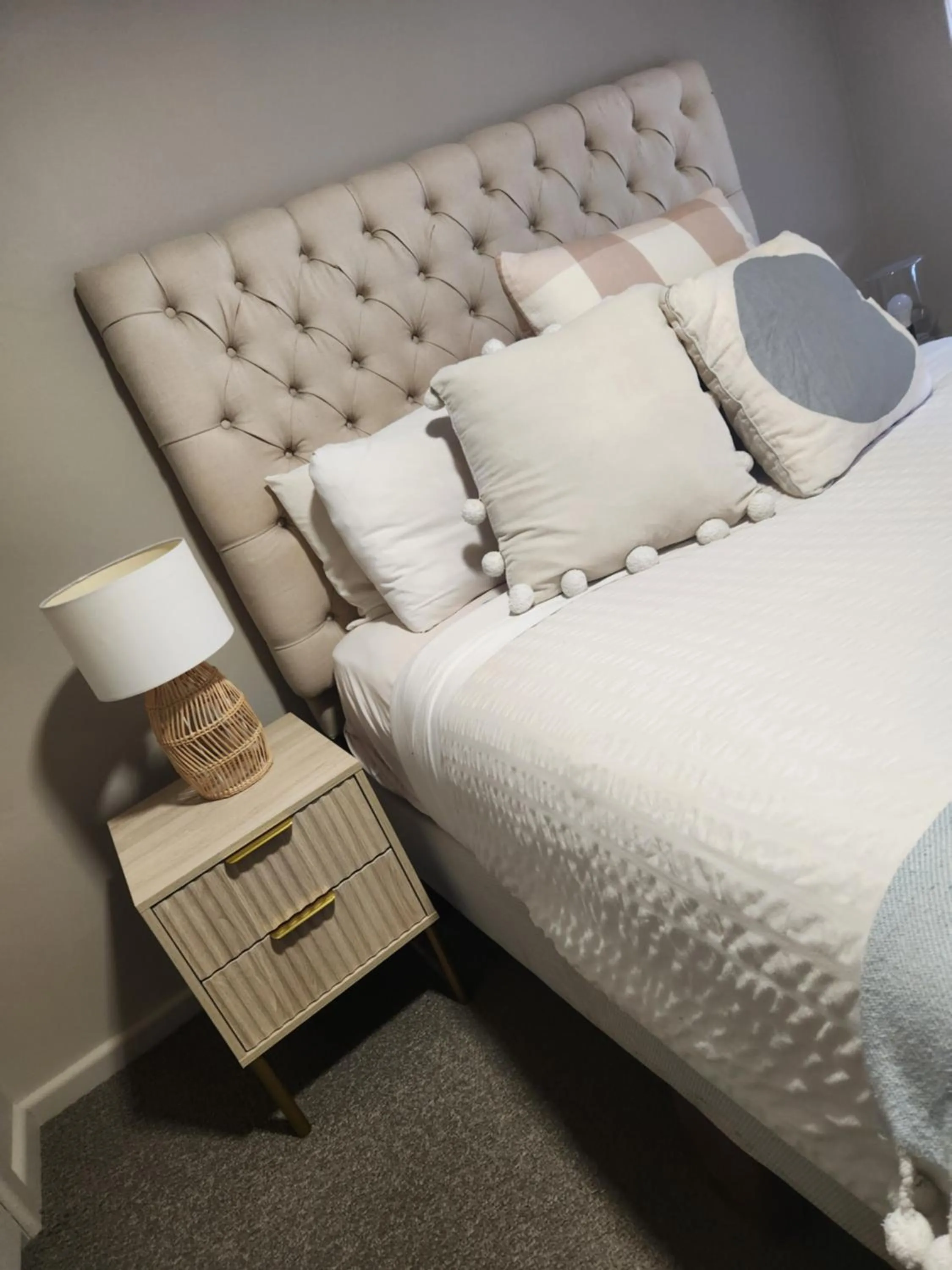 Bed in Kindred Studio Apartments