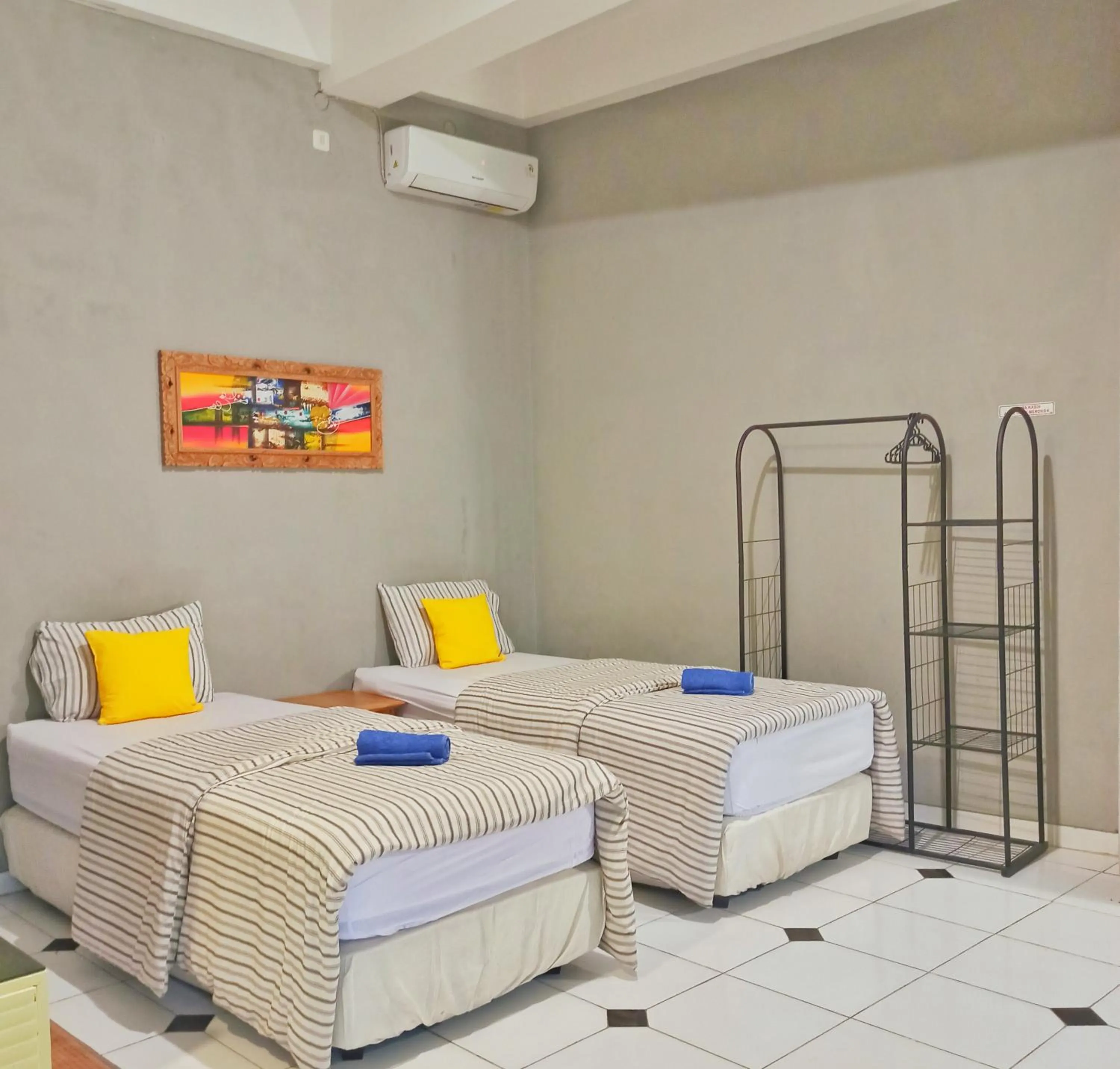 Bed in Manggolo Homestay Syariah