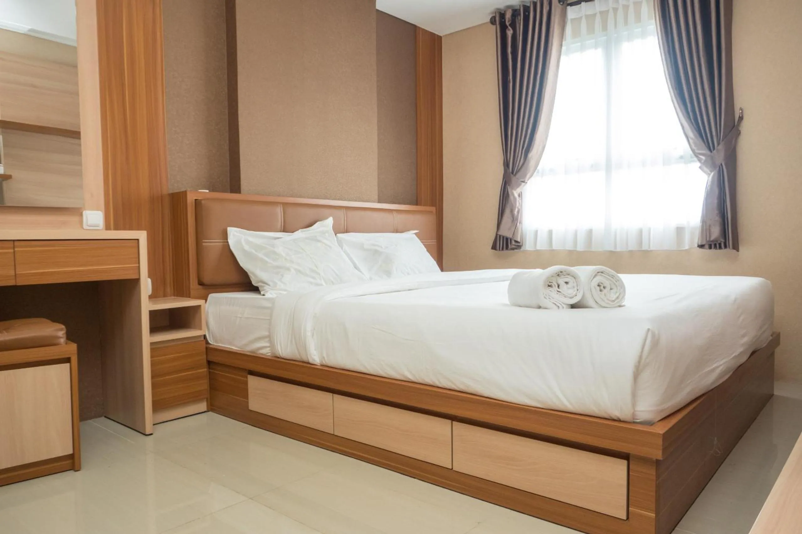 Three-Bedroom Apartment in 3BR with Sofa bed at Gateway Pasteur Apartment By Travelio