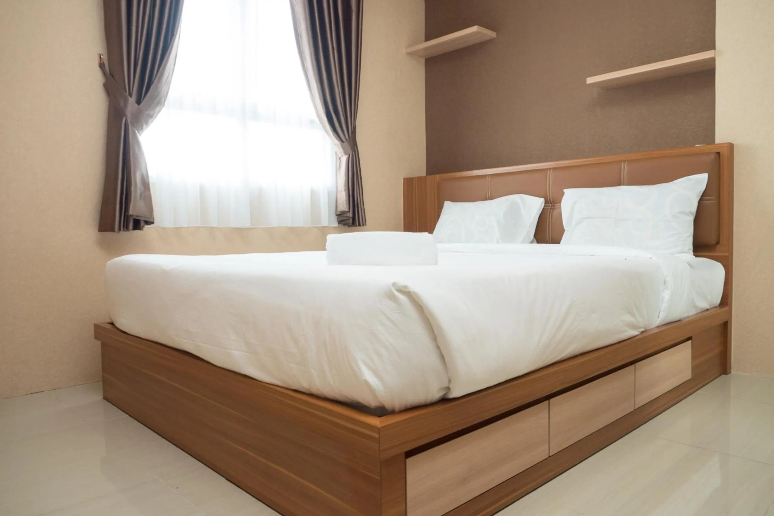 3BR with Sofa bed at Gateway Pasteur Apartment By Travelio