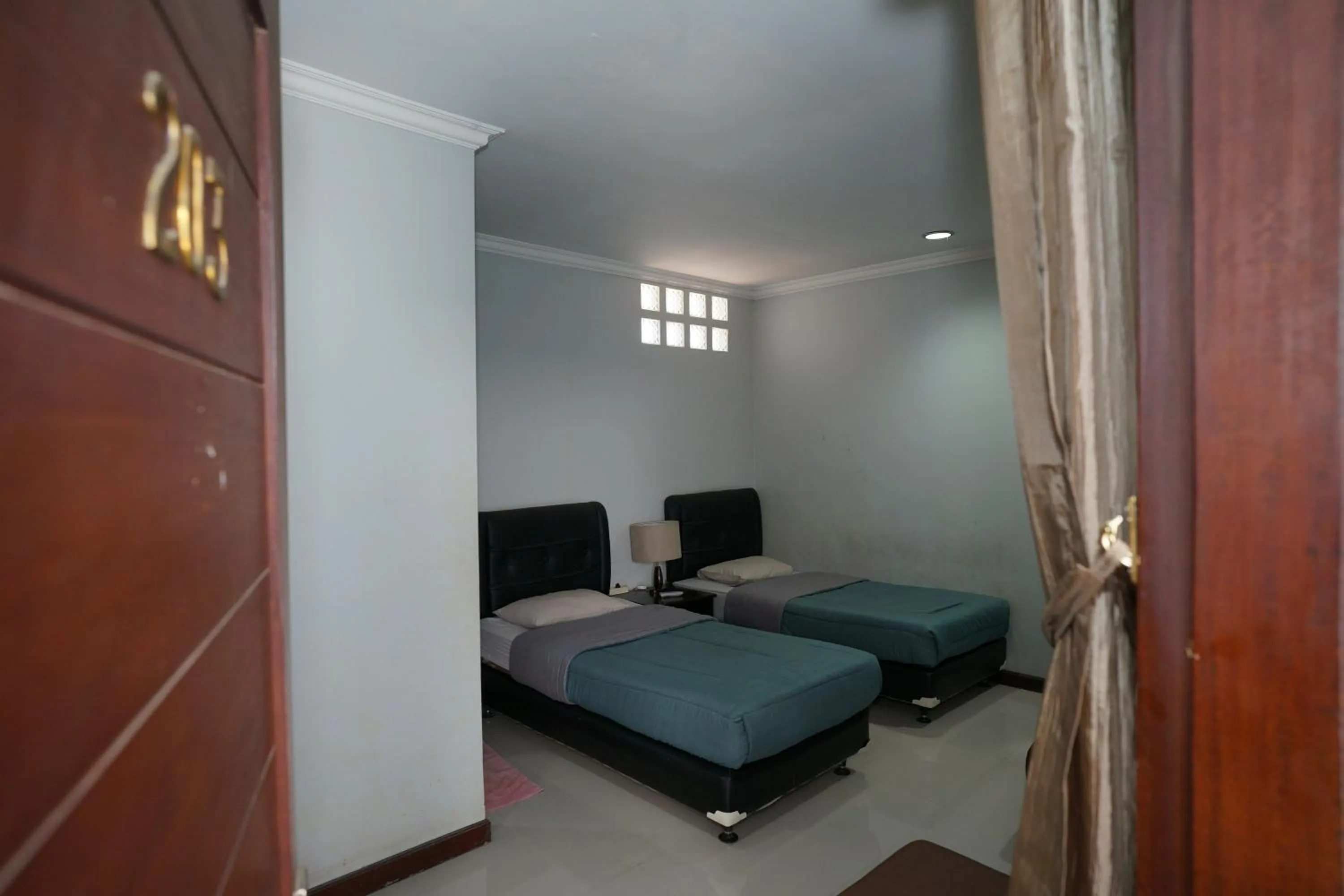 Bed in Hotel Puri Pangalengan