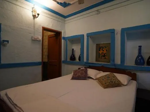 Bed in Yogis Guest House
