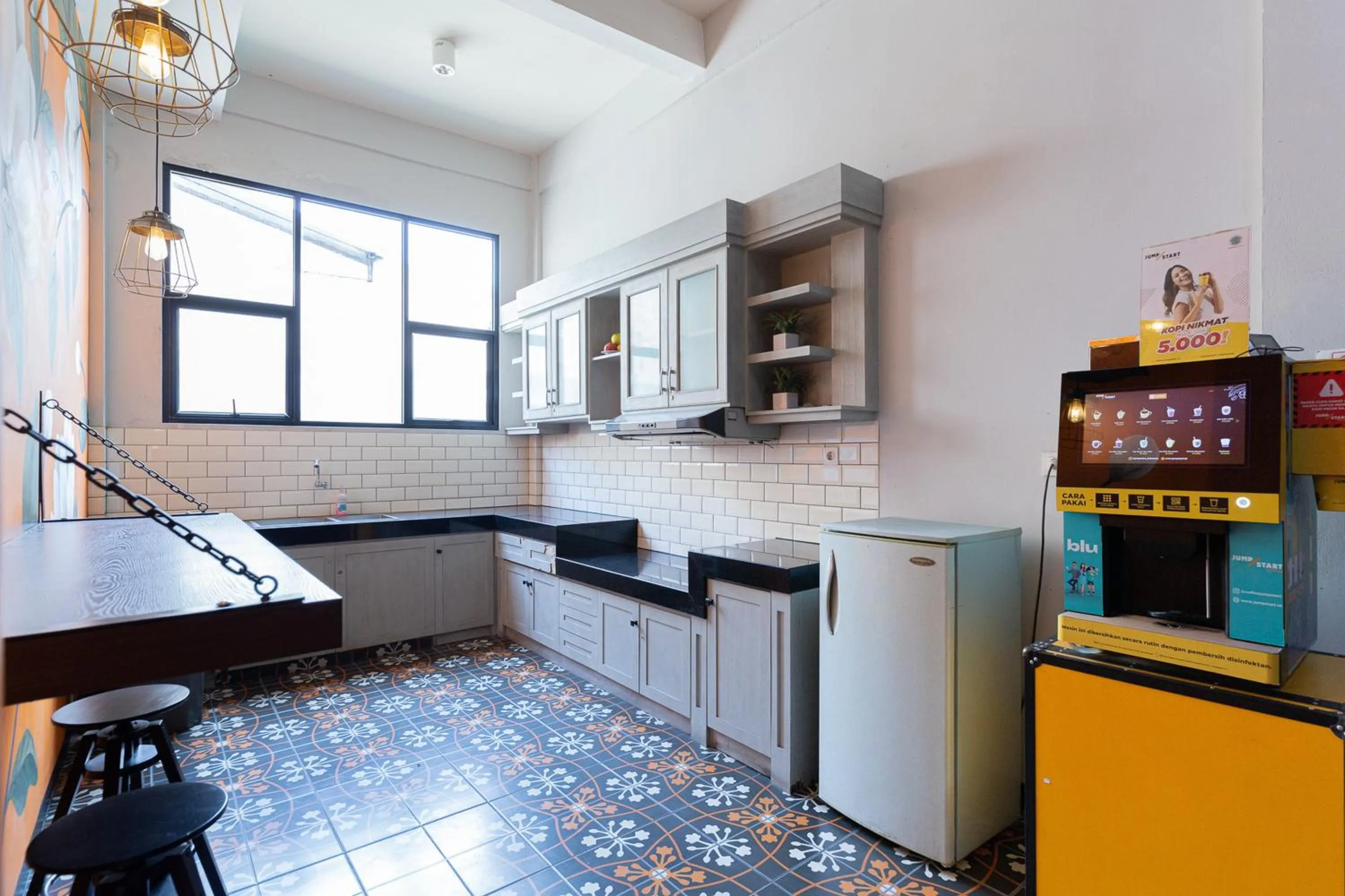 kitchen in RedDoorz Plus near Mall Slipi Jaya