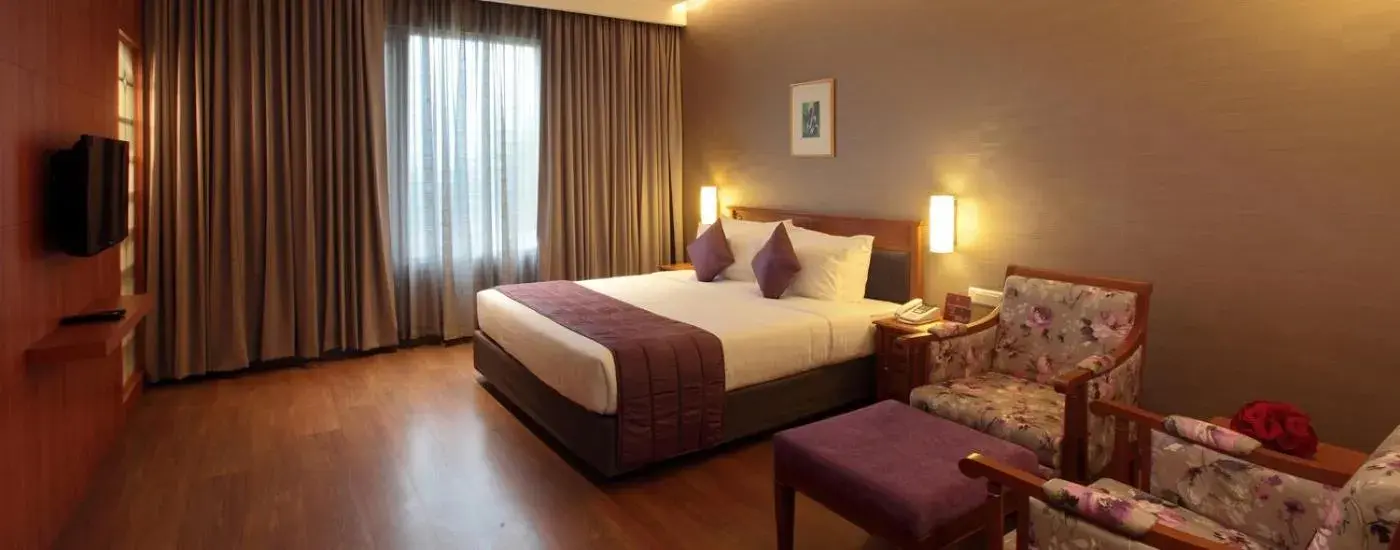 Bed in Monsoon Empress Kochi Bed in Monsoon Empress Kochi