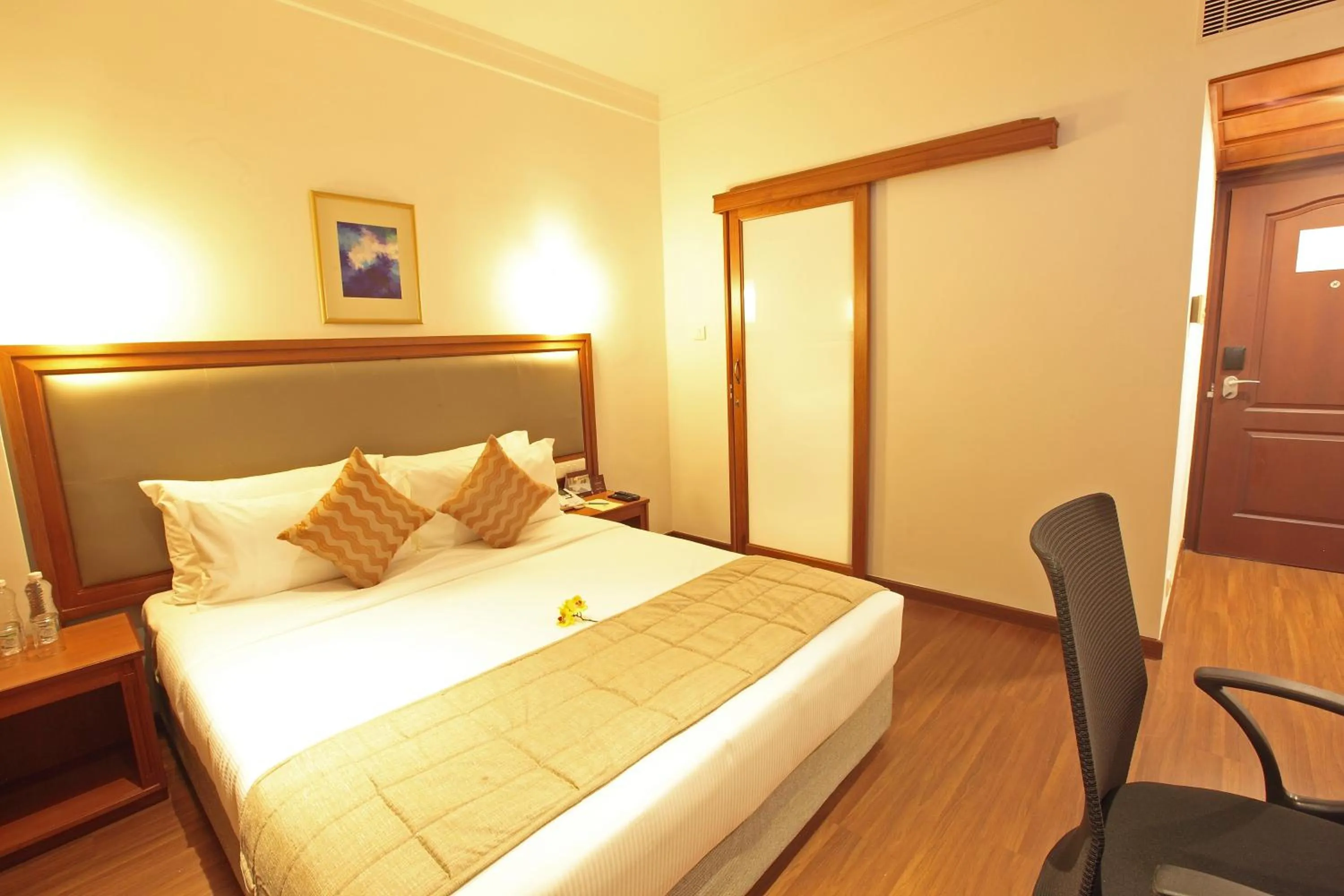 Bed in Monsoon Empress Kochi