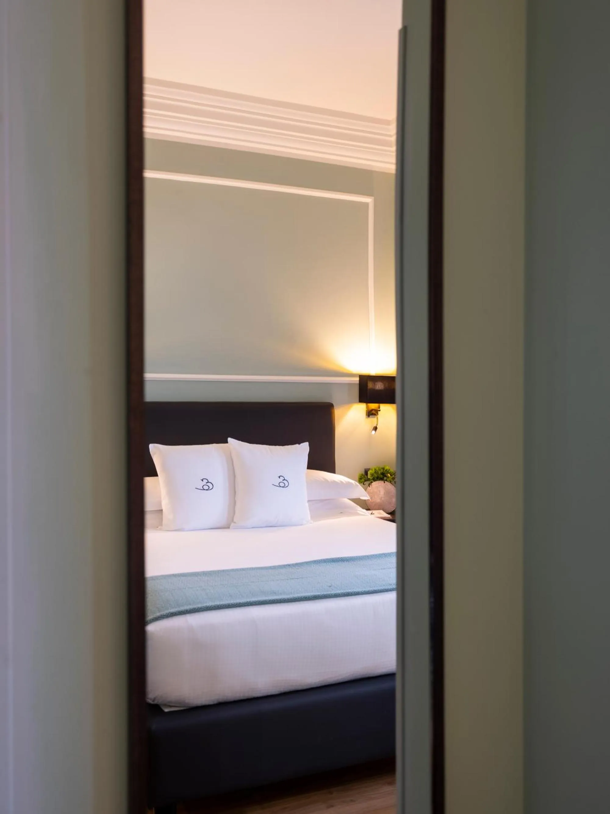 Bed in Elizabeth Lifestyle Hotel