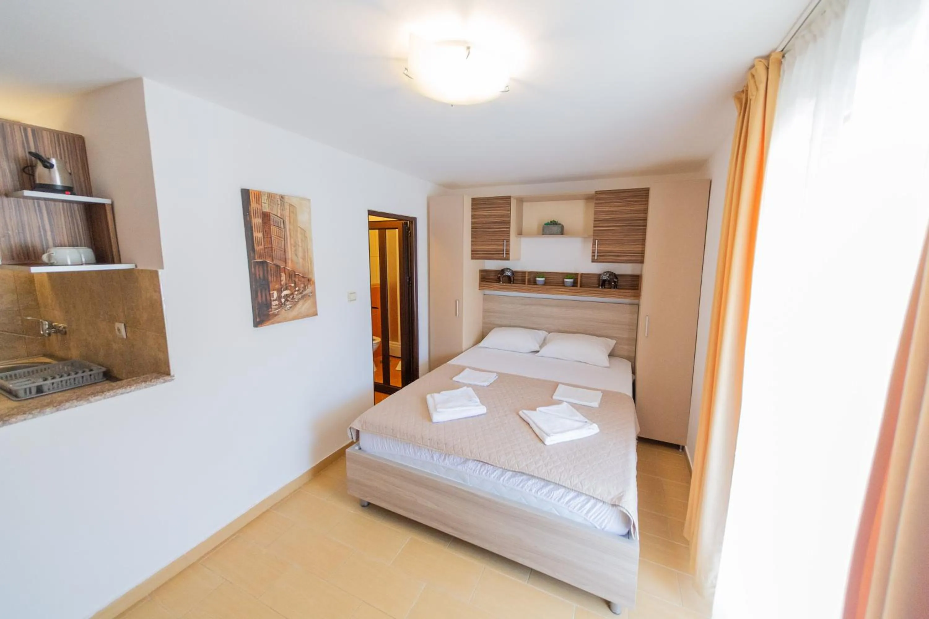 Text overlay, Bed in Azzuro apartments Budva