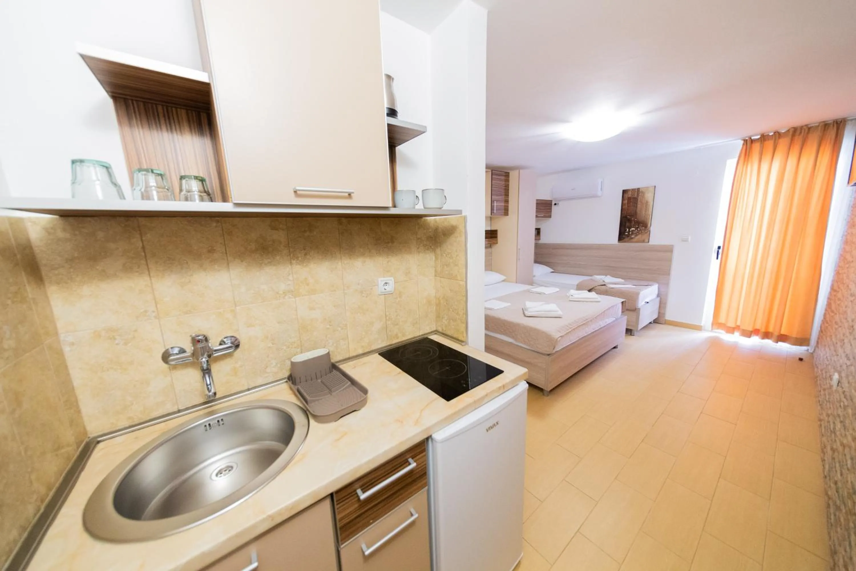 Text overlay, Bed in Azzuro apartments Budva