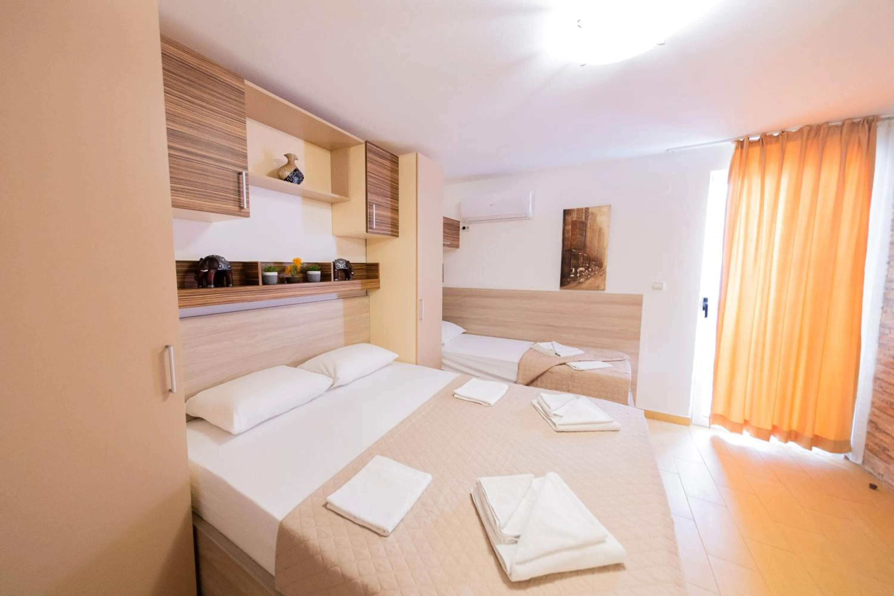 Text overlay, Bed in Azzuro apartments Budva