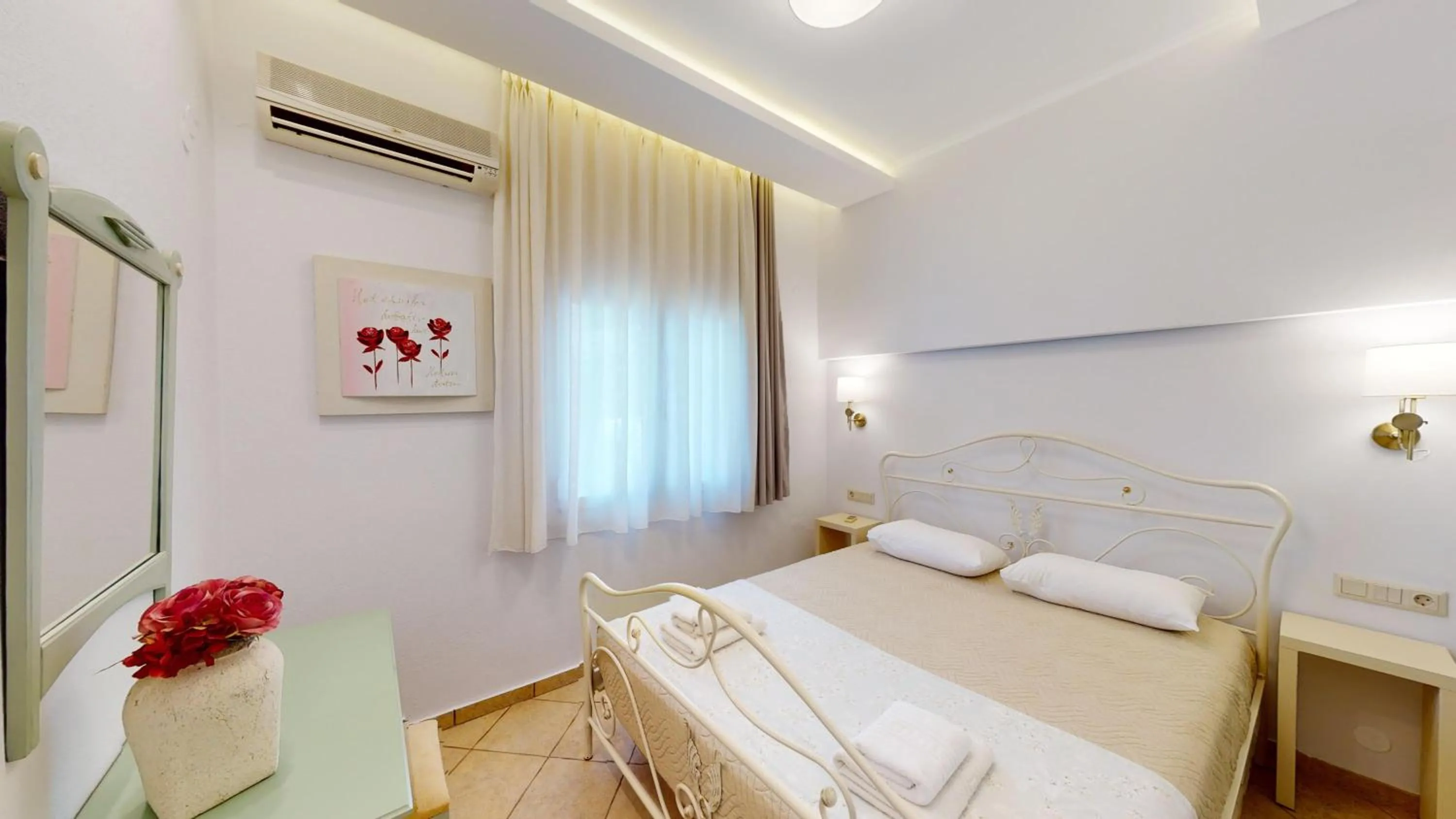 Bed in Aneria Suites