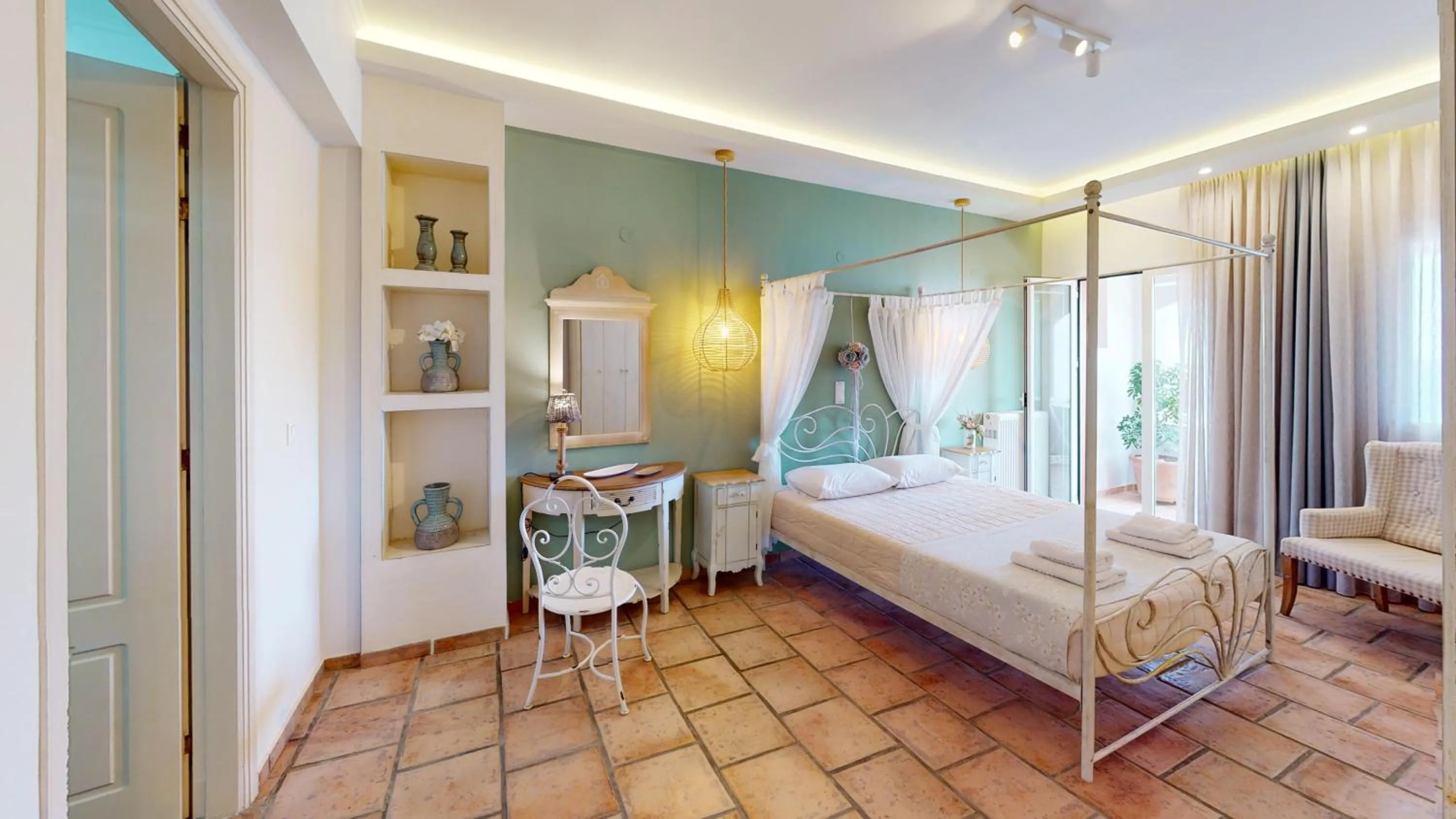 Bed in Aneria Suites