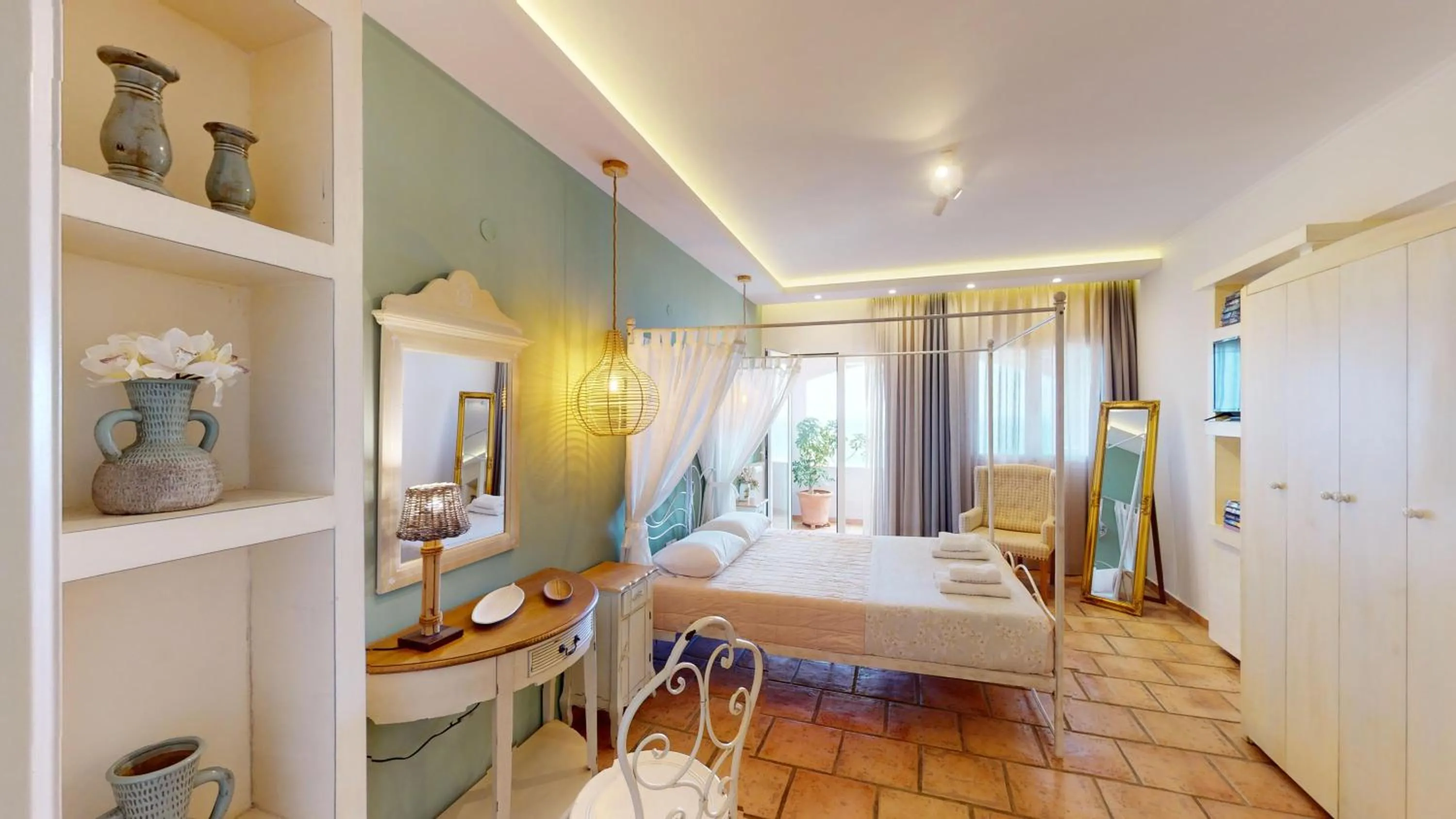 Bed in Aneria Suites