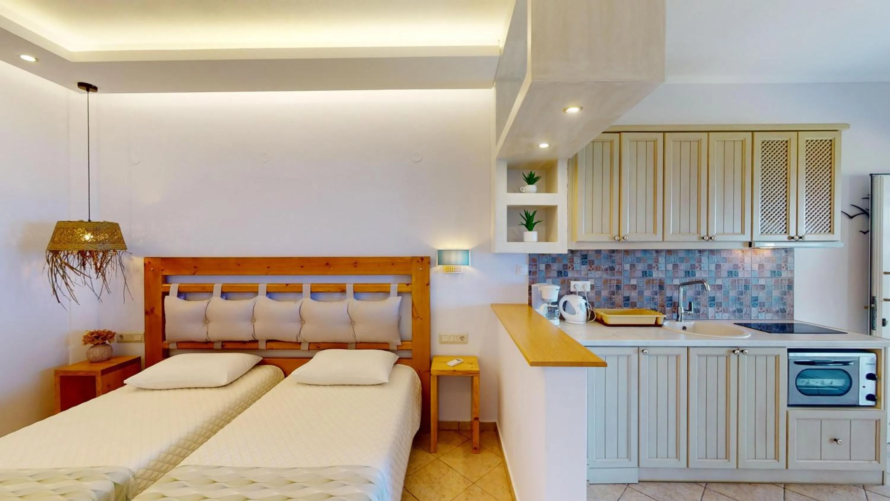 Bed in Aneria Suites