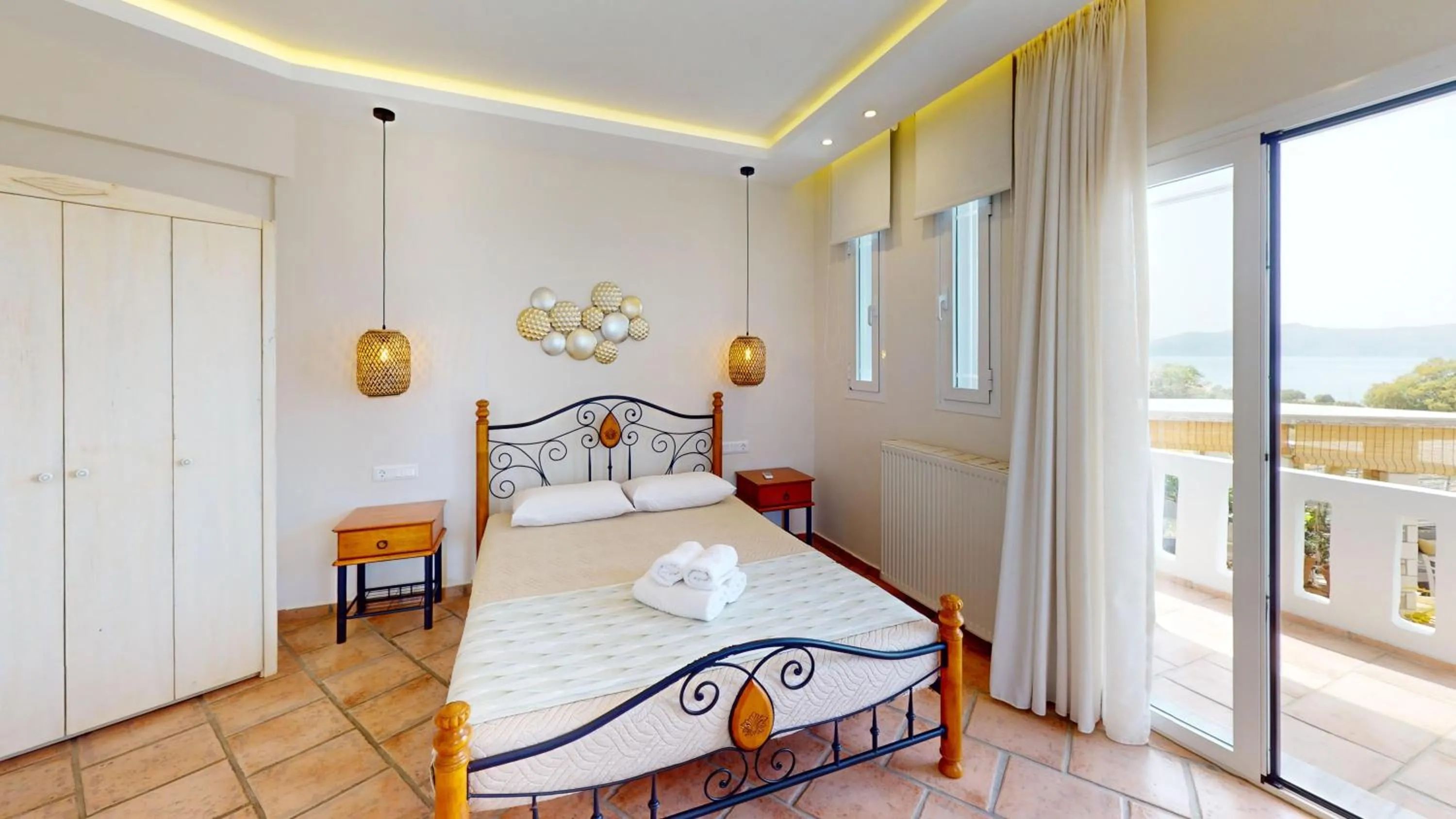 Bed in Aneria Suites