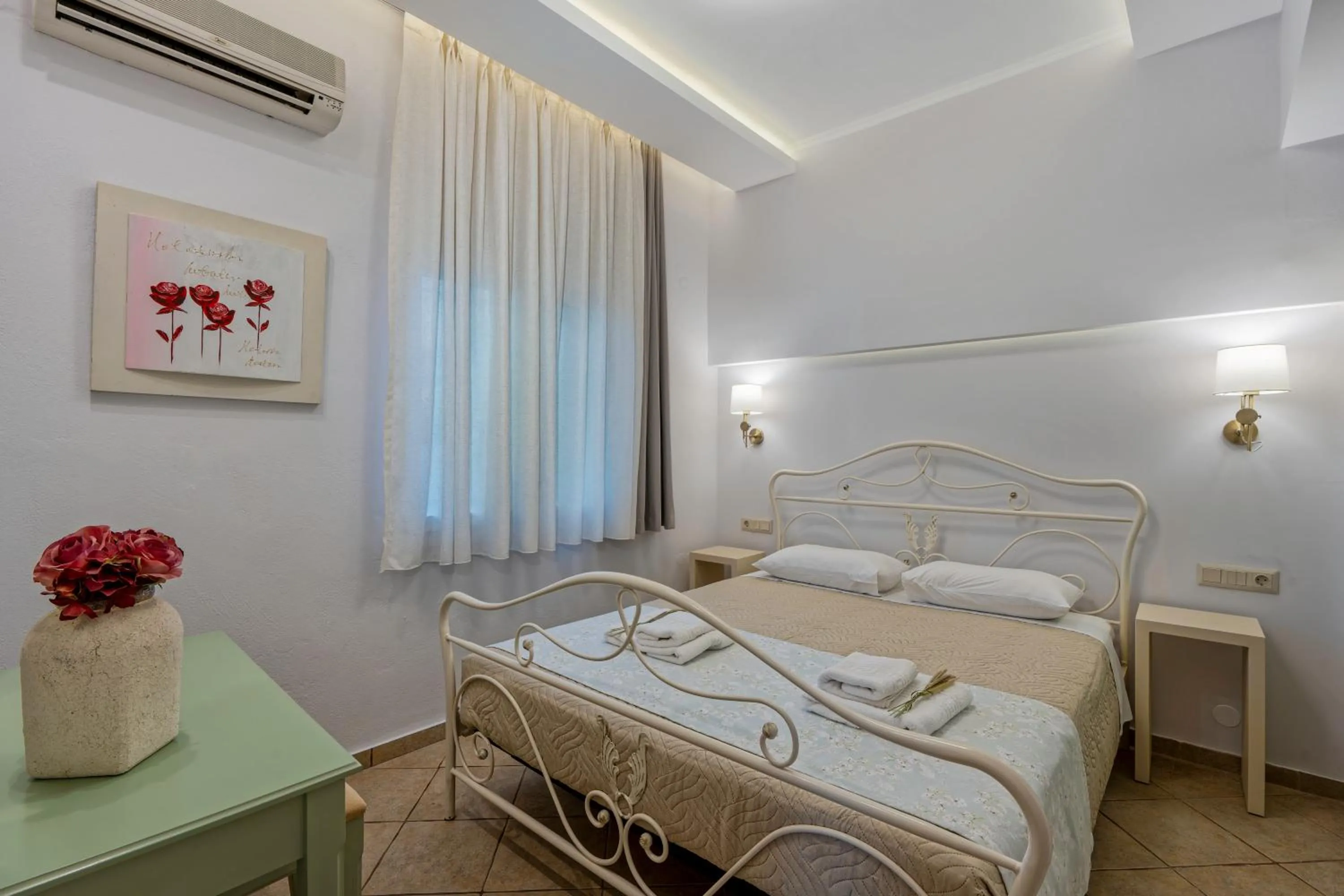 Bed in Aneria Suites