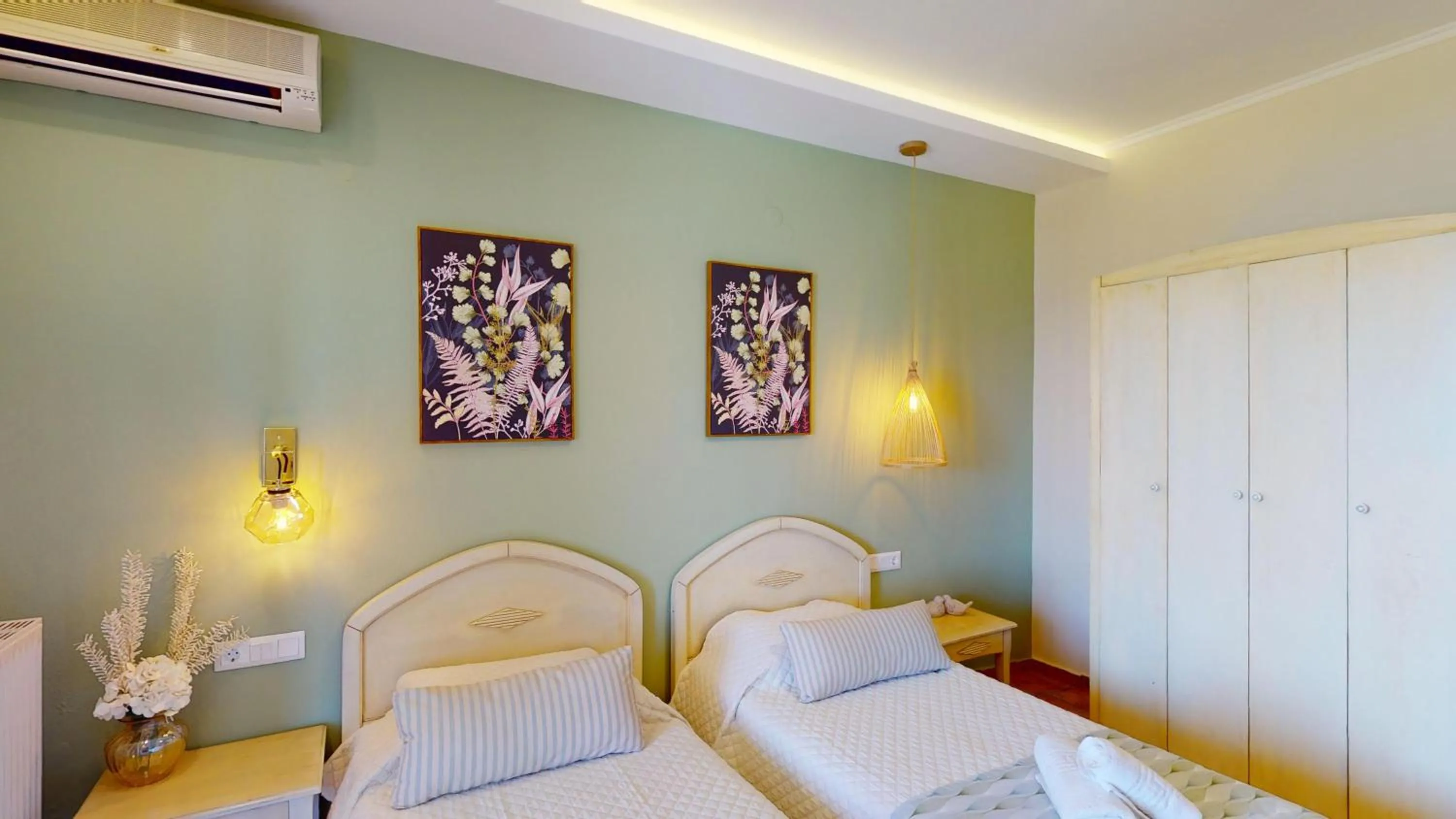 Bed in Aneria Suites