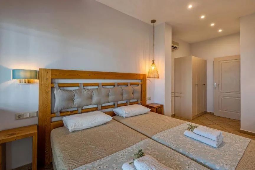 Bed in Aneria Suites