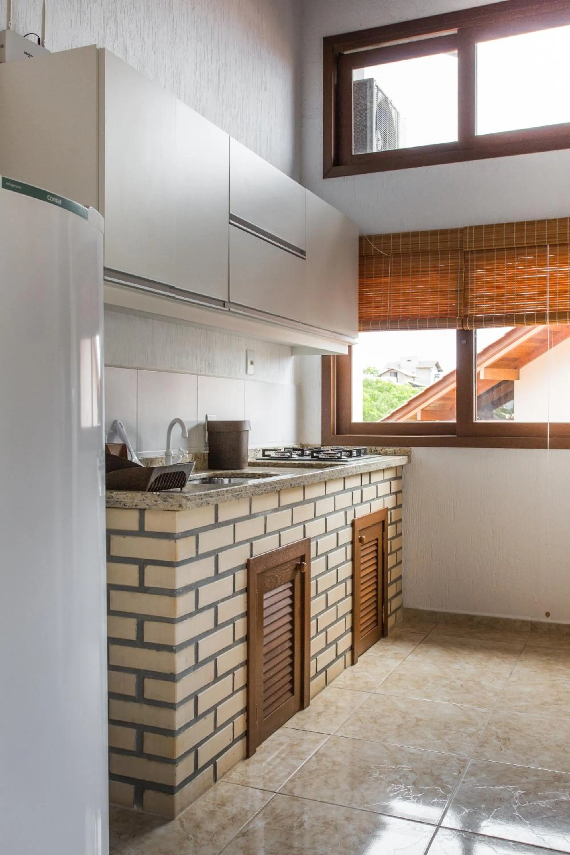 Kitchen or kitchenette in Pousada Areias do Rosa