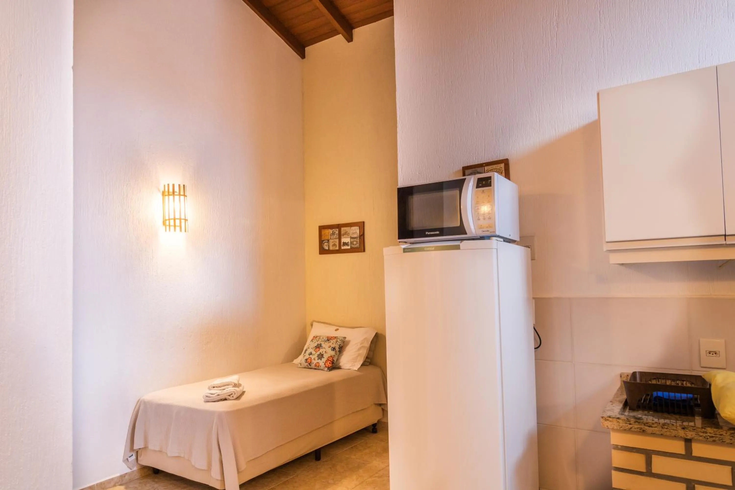 Bed in Pousada Areias do Rosa