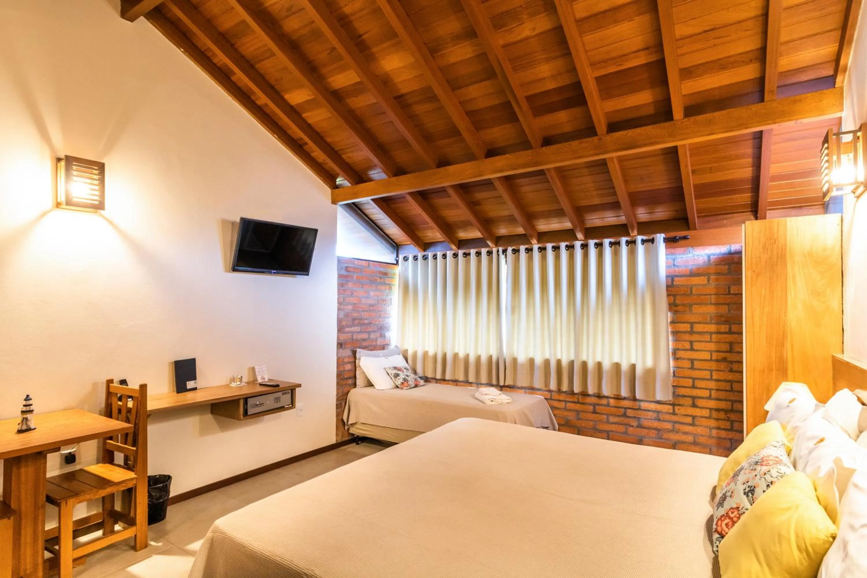 Bed in Pousada Areias do Rosa