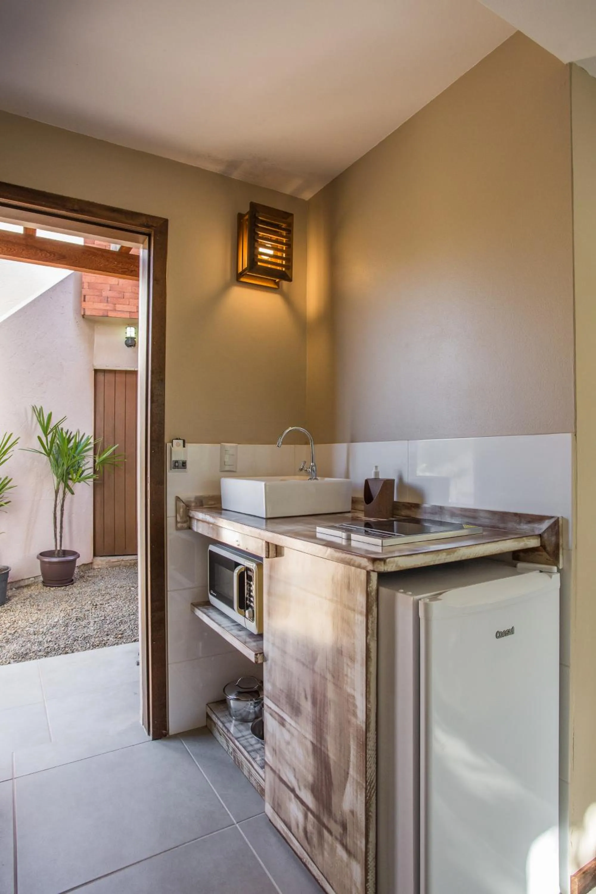 Kitchen or kitchenette in Pousada Areias do Rosa