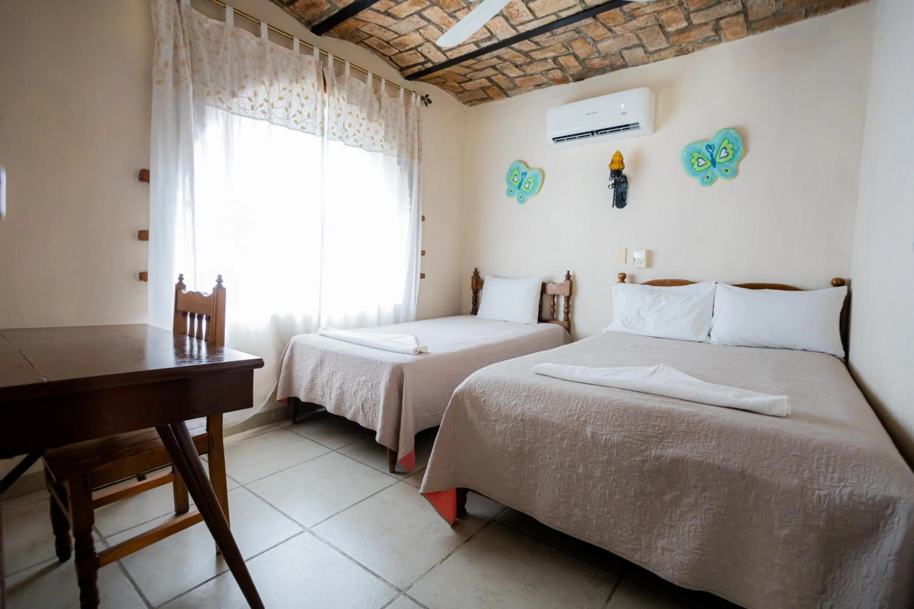 Bed in Bungalows Maria Teresa