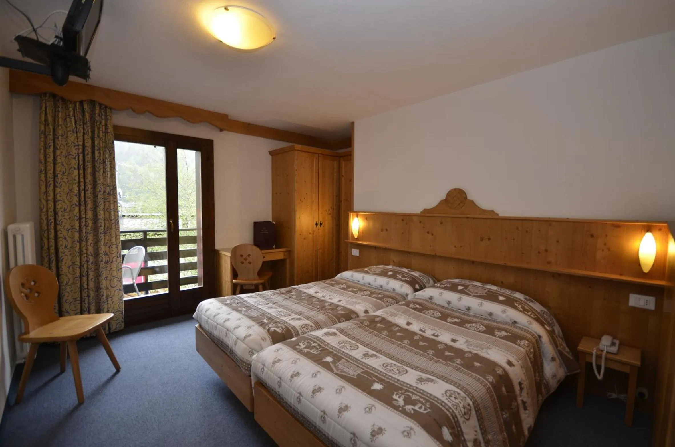 Decorative detail, Bed in Hotel Cime D'Oro