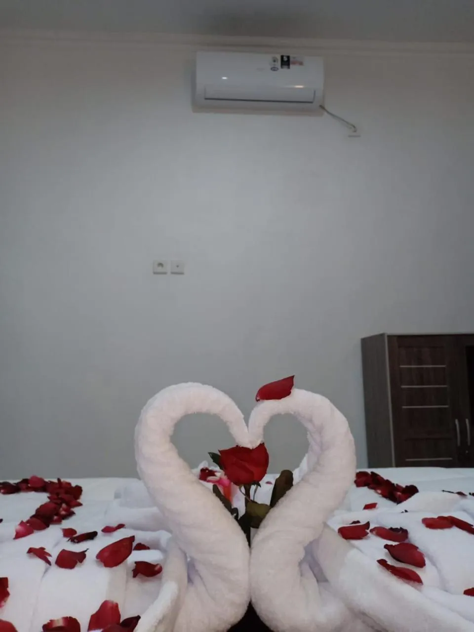 Bed in Santhi Guna Bungalow