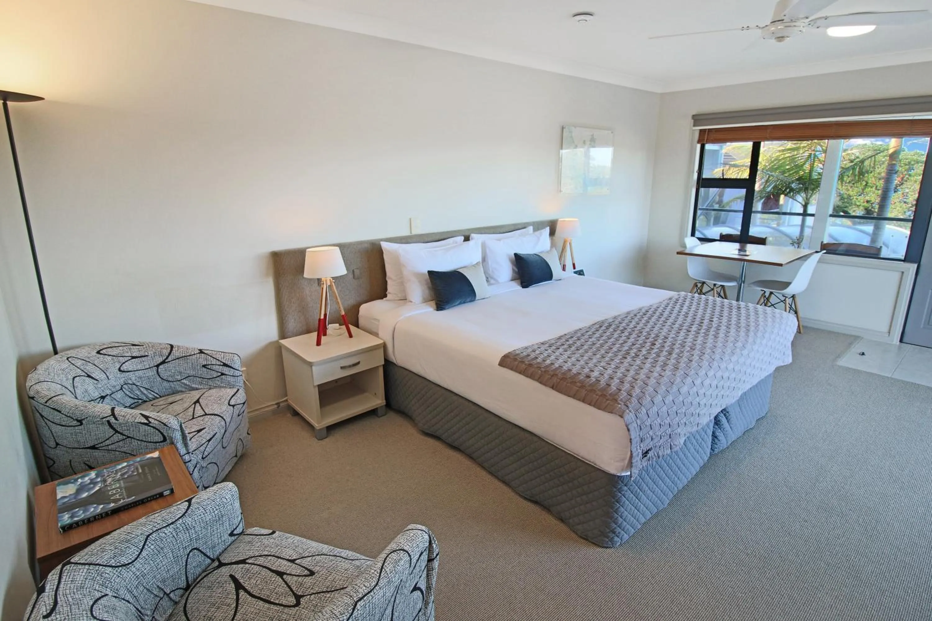 Bed in Whangaparaoa Lodge