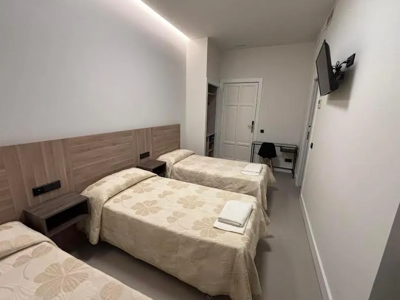 Bed in Hostal Excelsior