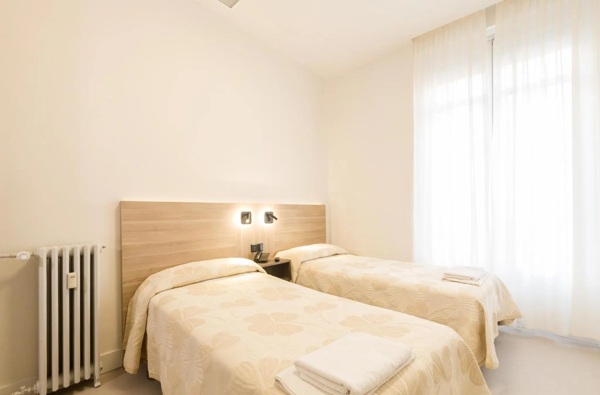 Bed in Hostal Excelsior