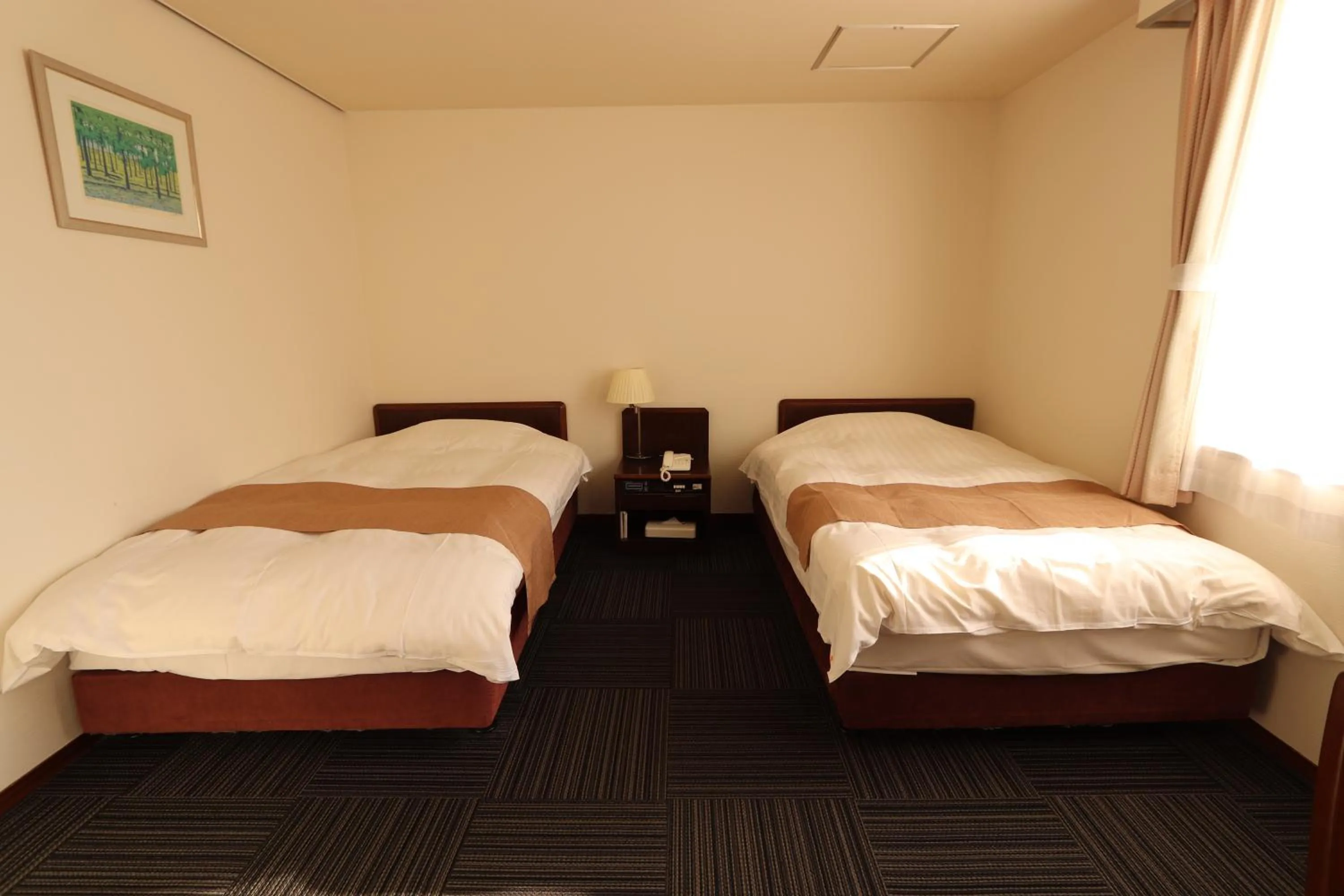 Photo of the whole room, Bed in Yufuin Hotel Shuhokan